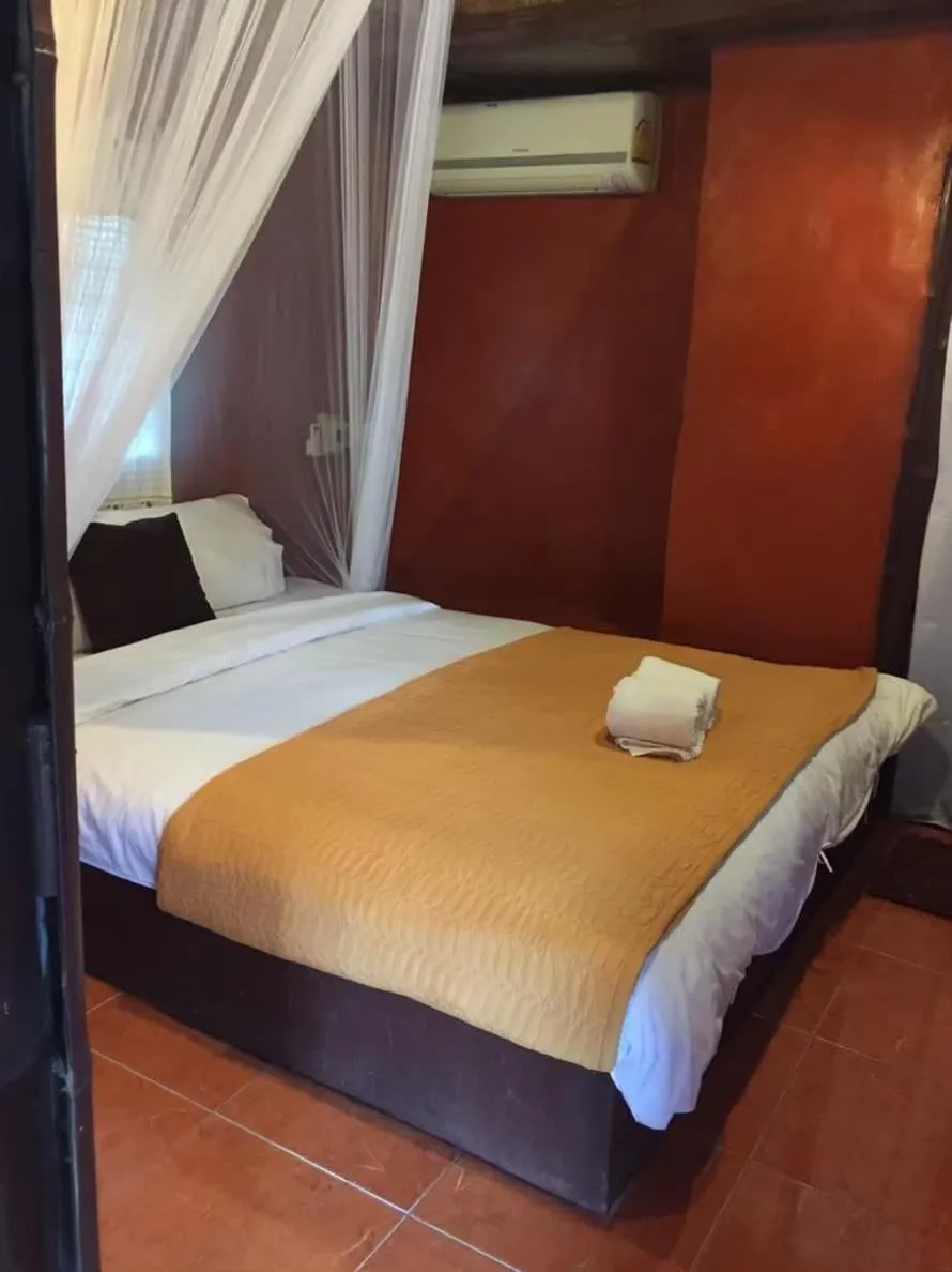 Bed in Ban Din Resort Chiang Rai