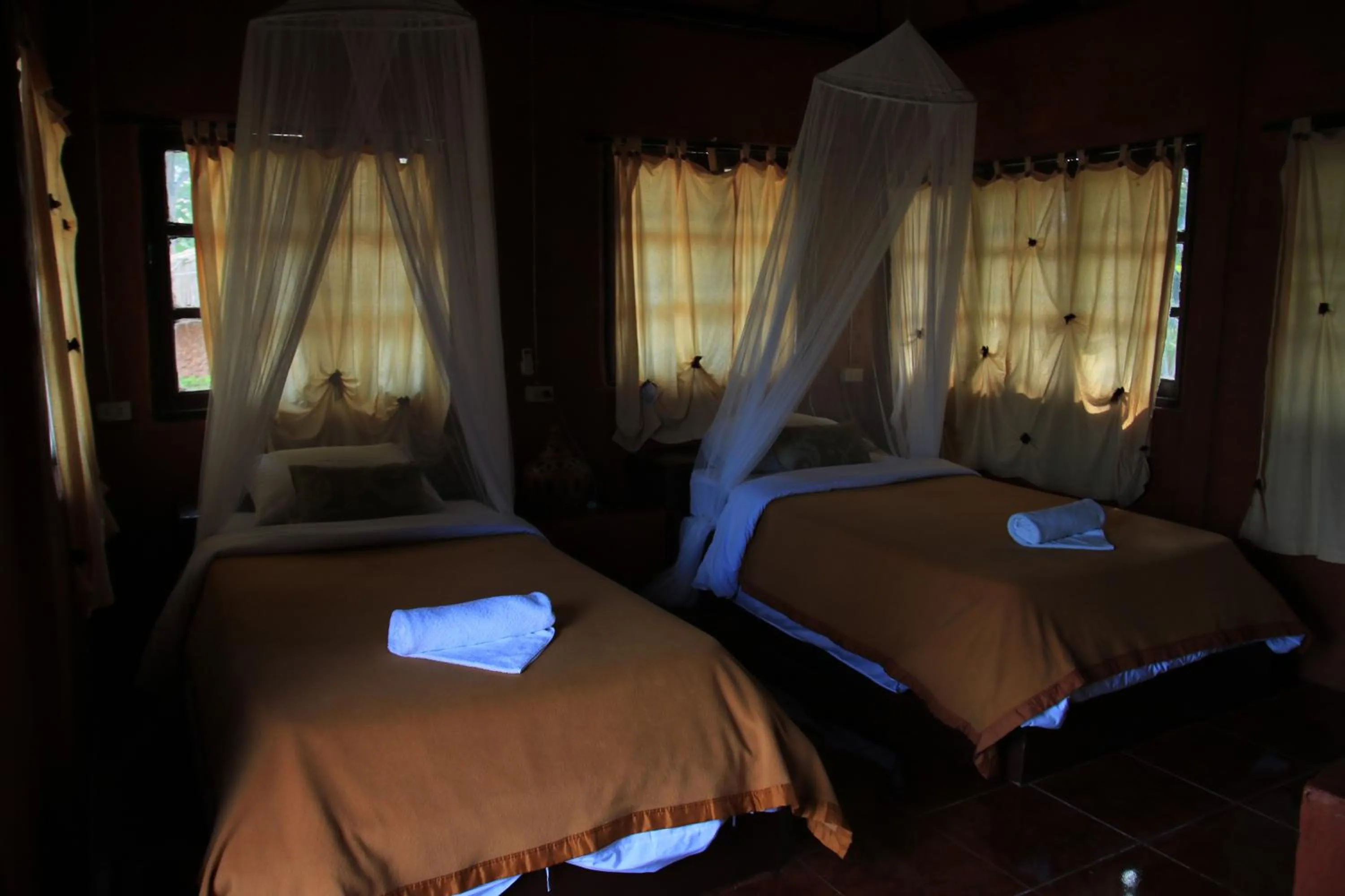 Bed in Ban Din Resort Chiang Rai