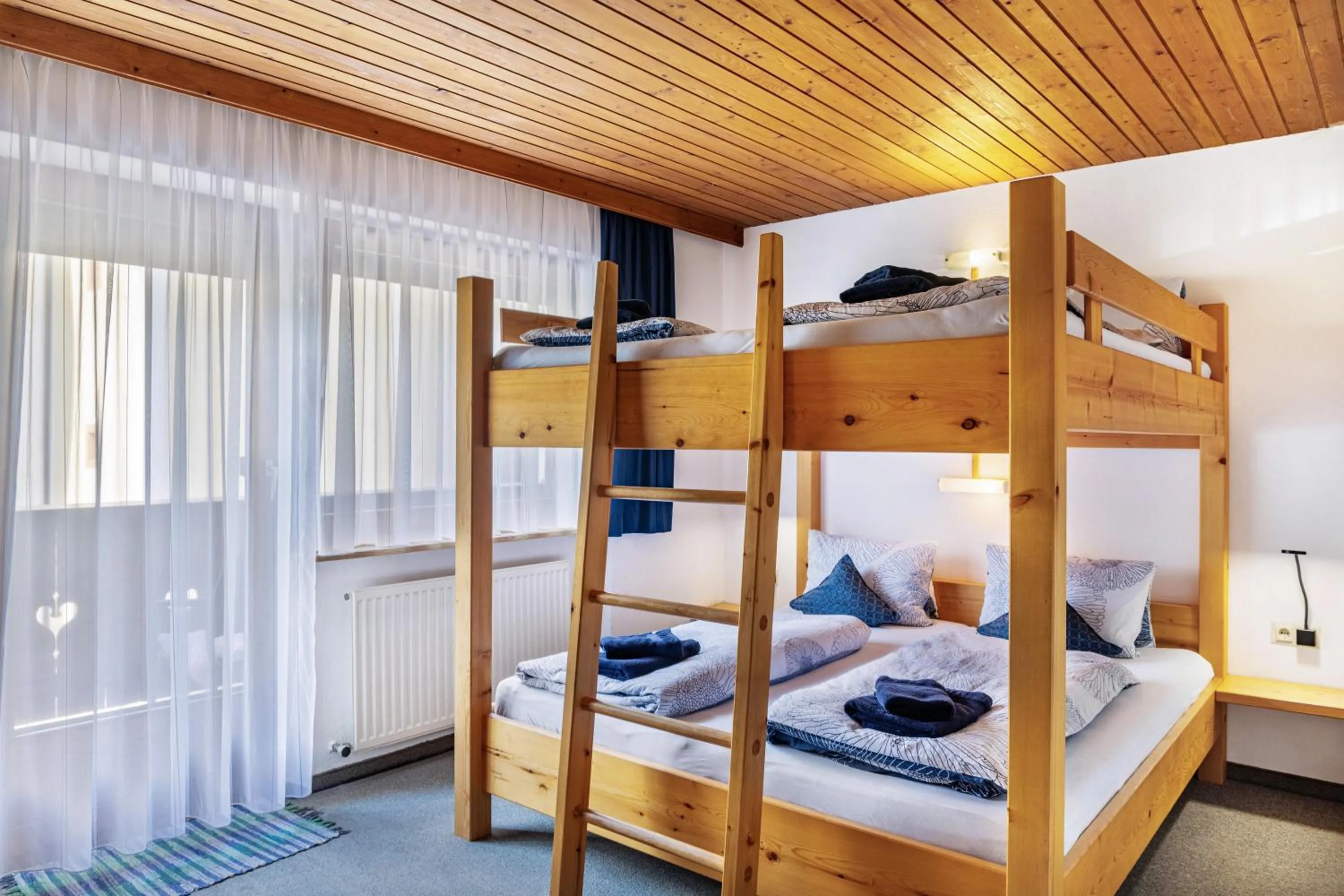 Property building, Bed in Studio Hochzillertal mit Sauna