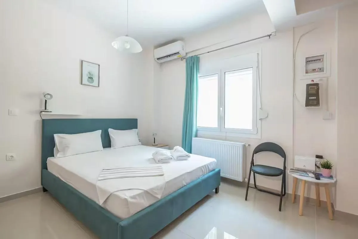 Bed in Cozy Acropolis Studio in the heart of Athens