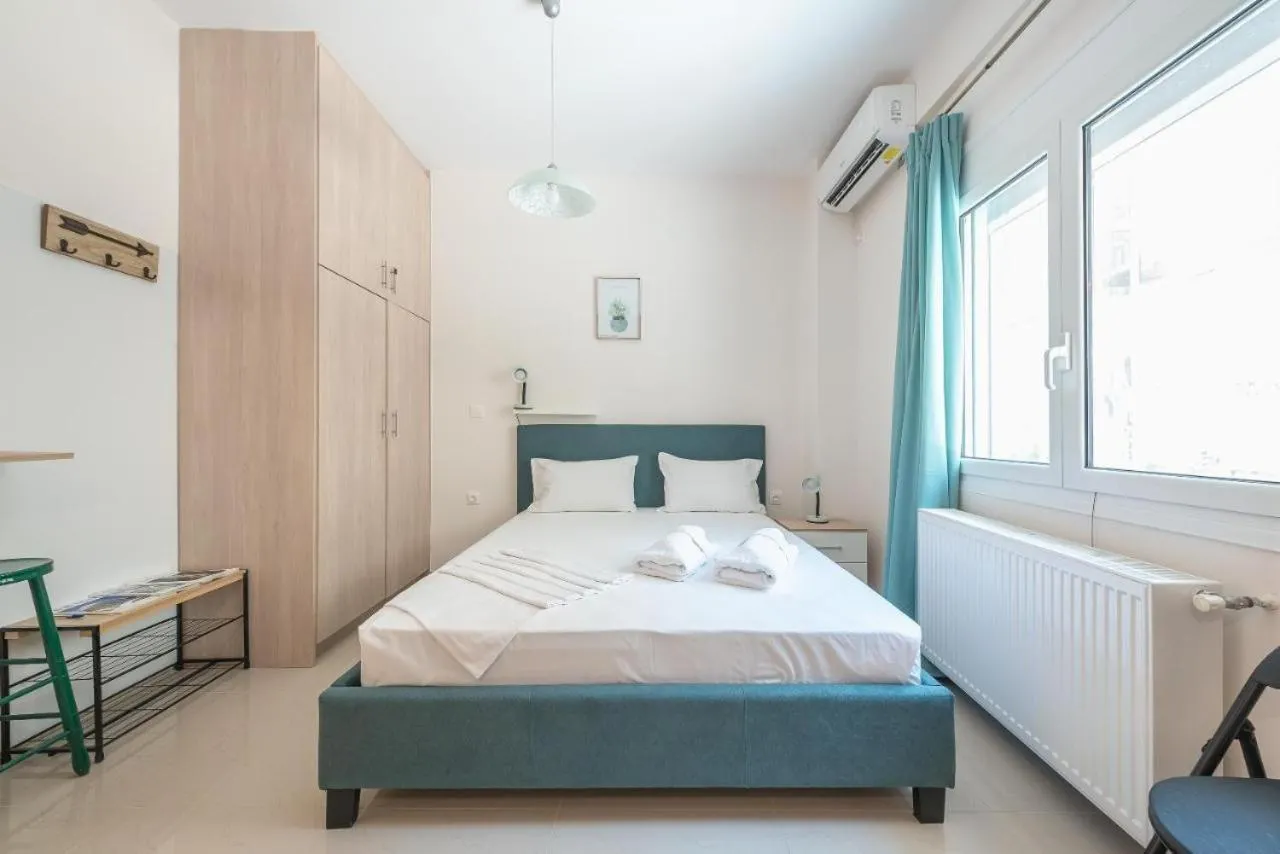 Bed in Cozy Acropolis Studio in the heart of Athens