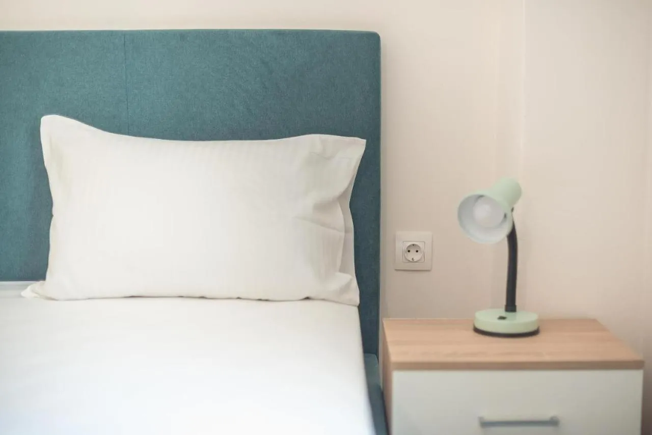 Bed in Cozy Acropolis Studio in the heart of Athens