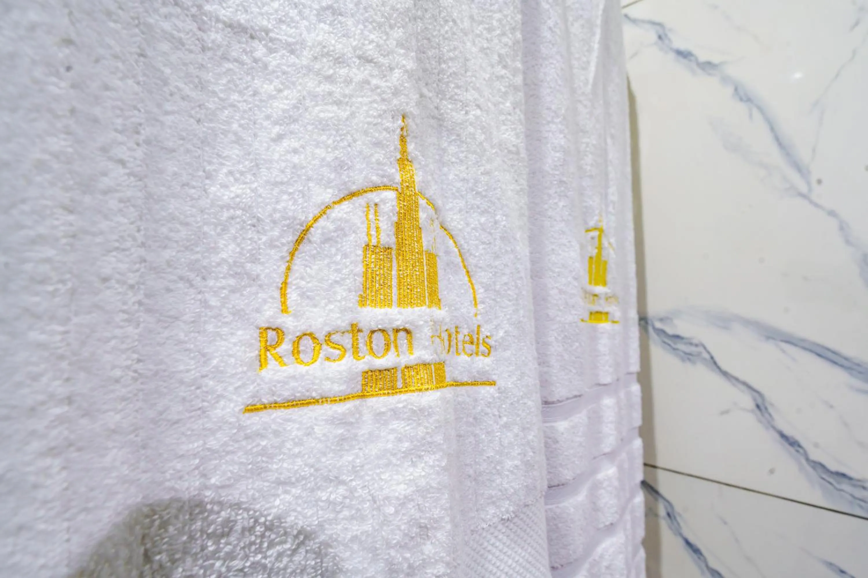 Property logo or sign in Roston Hotels