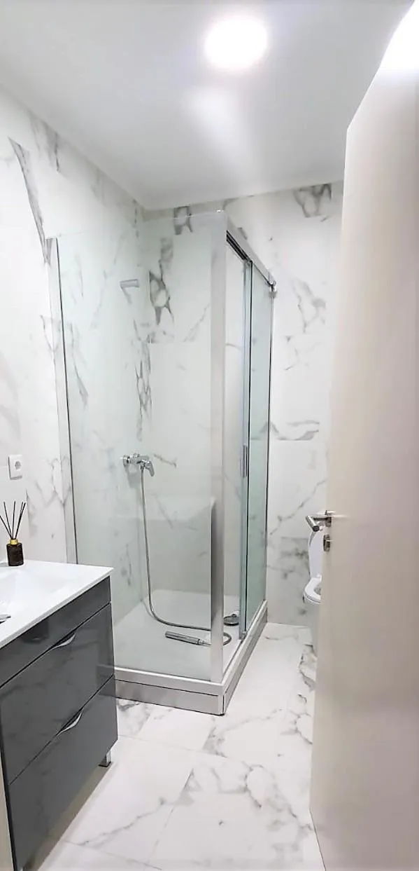 Bathroom in Charming House - O Mercado