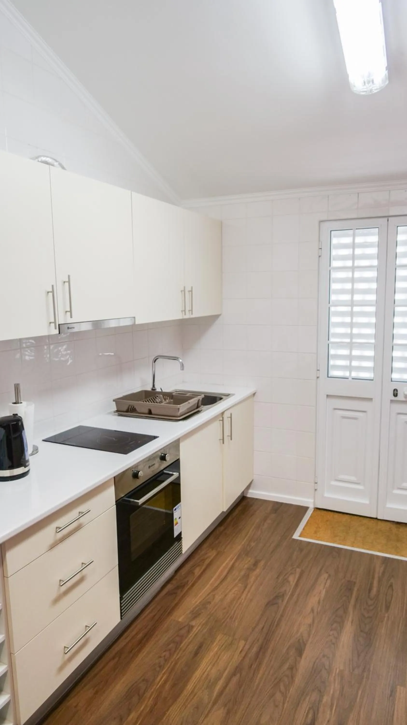 Kitchen or kitchenette in Charming House - O Mercado