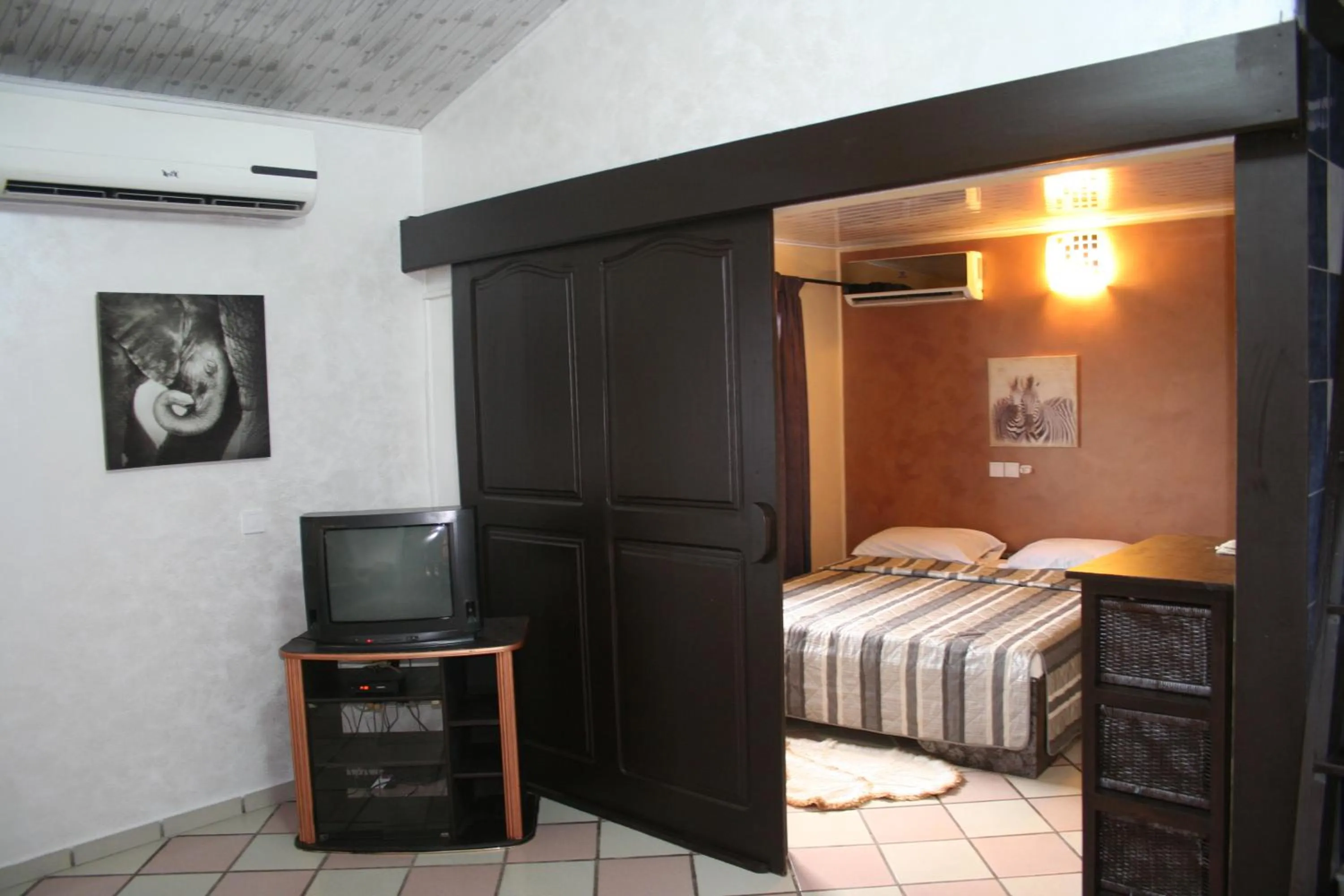 Bed in Hotel Napoleon Lagune