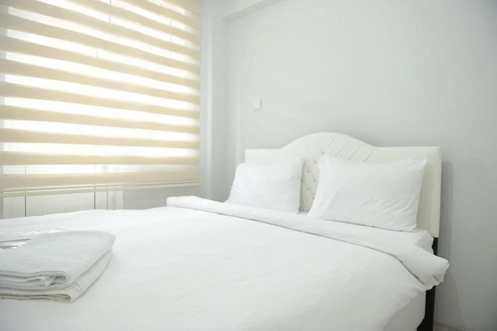 Bed in Sea House Otel