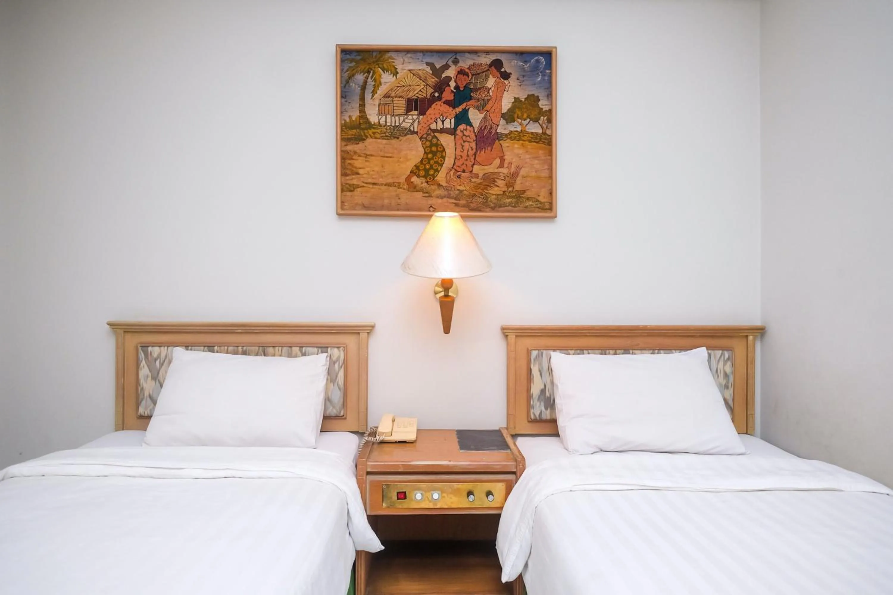 Bed in Hotel Surya Asia