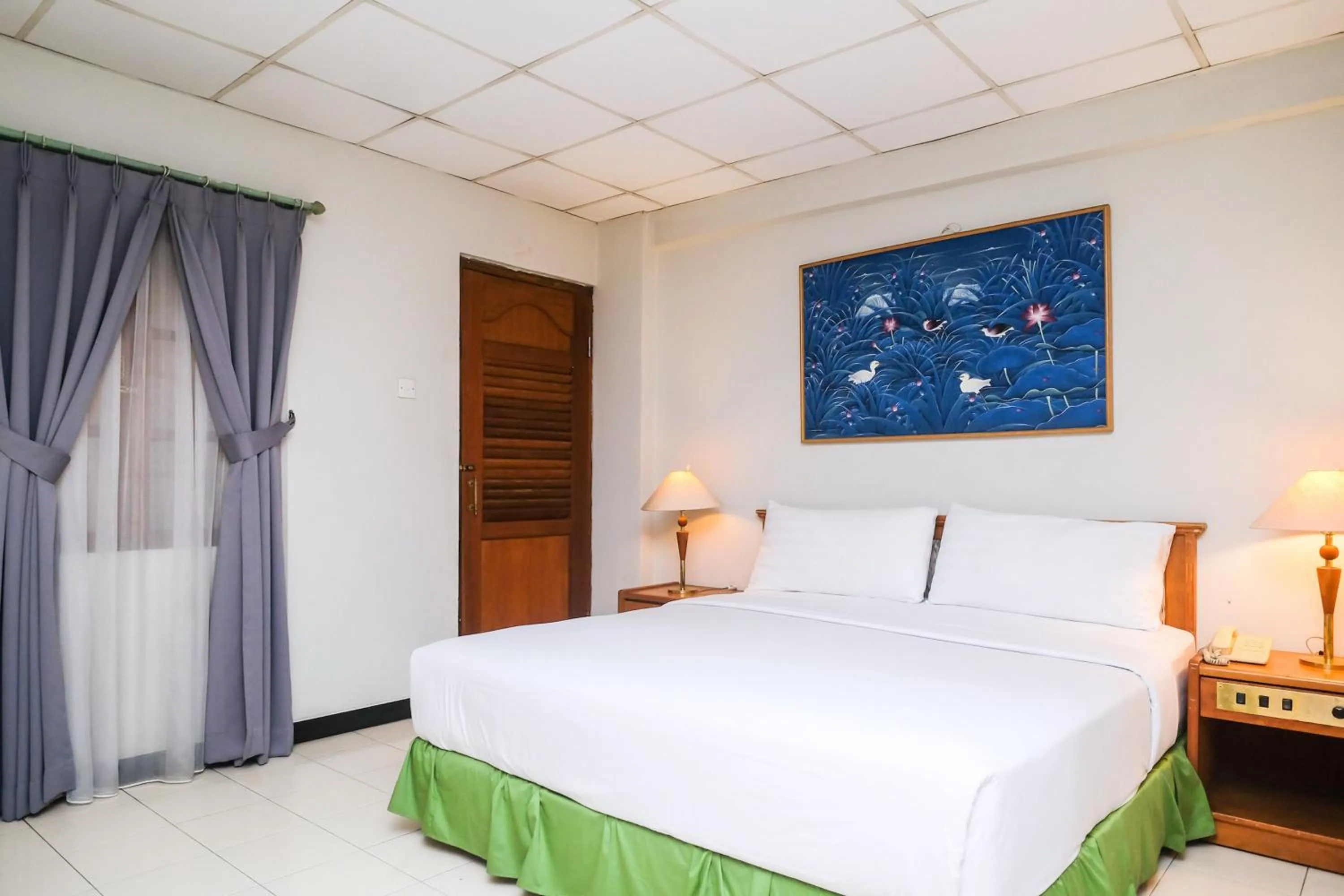 Bed in Hotel Surya Asia