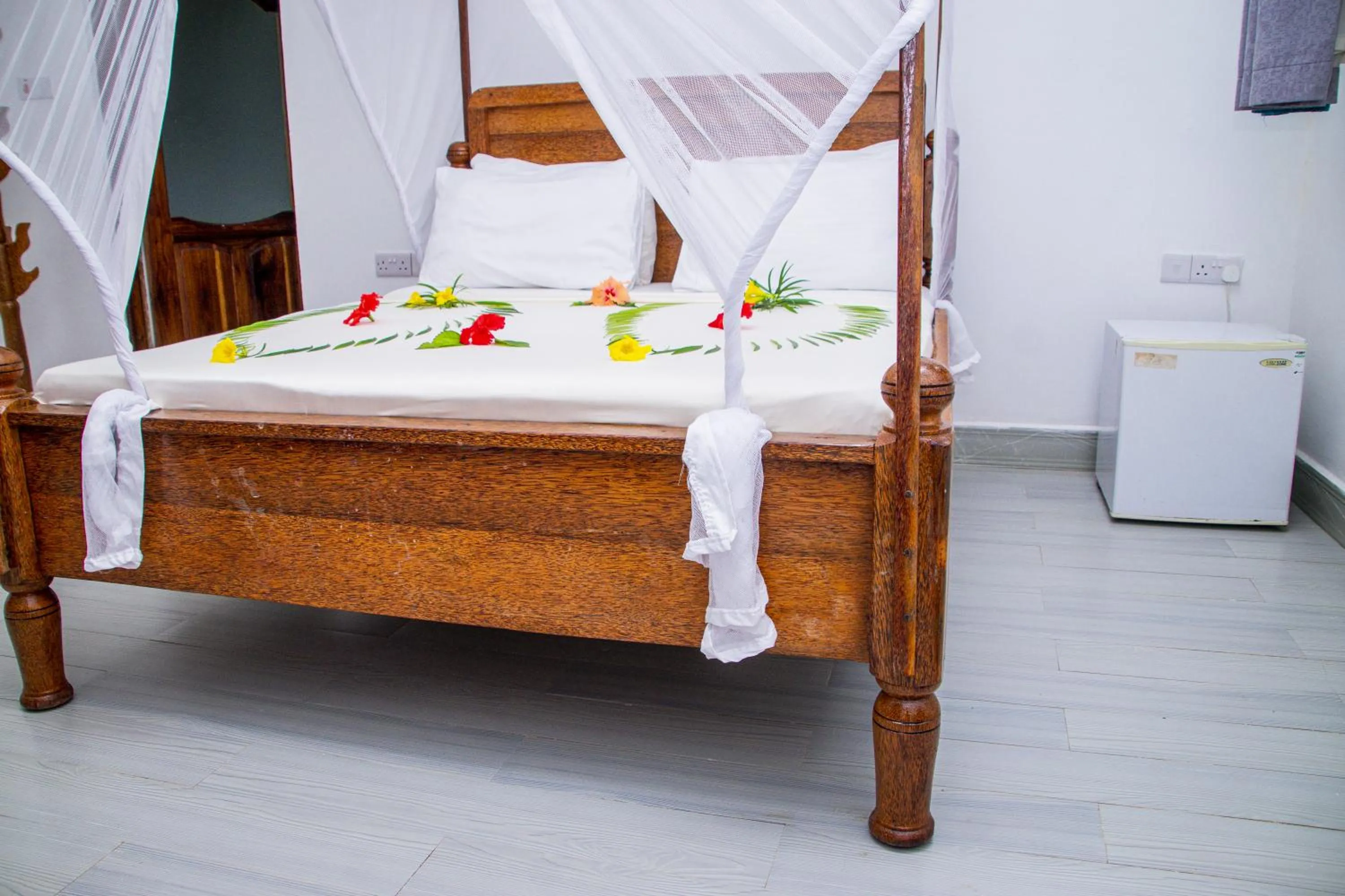 Bed in Amazing Beach Hotel Zanzibar