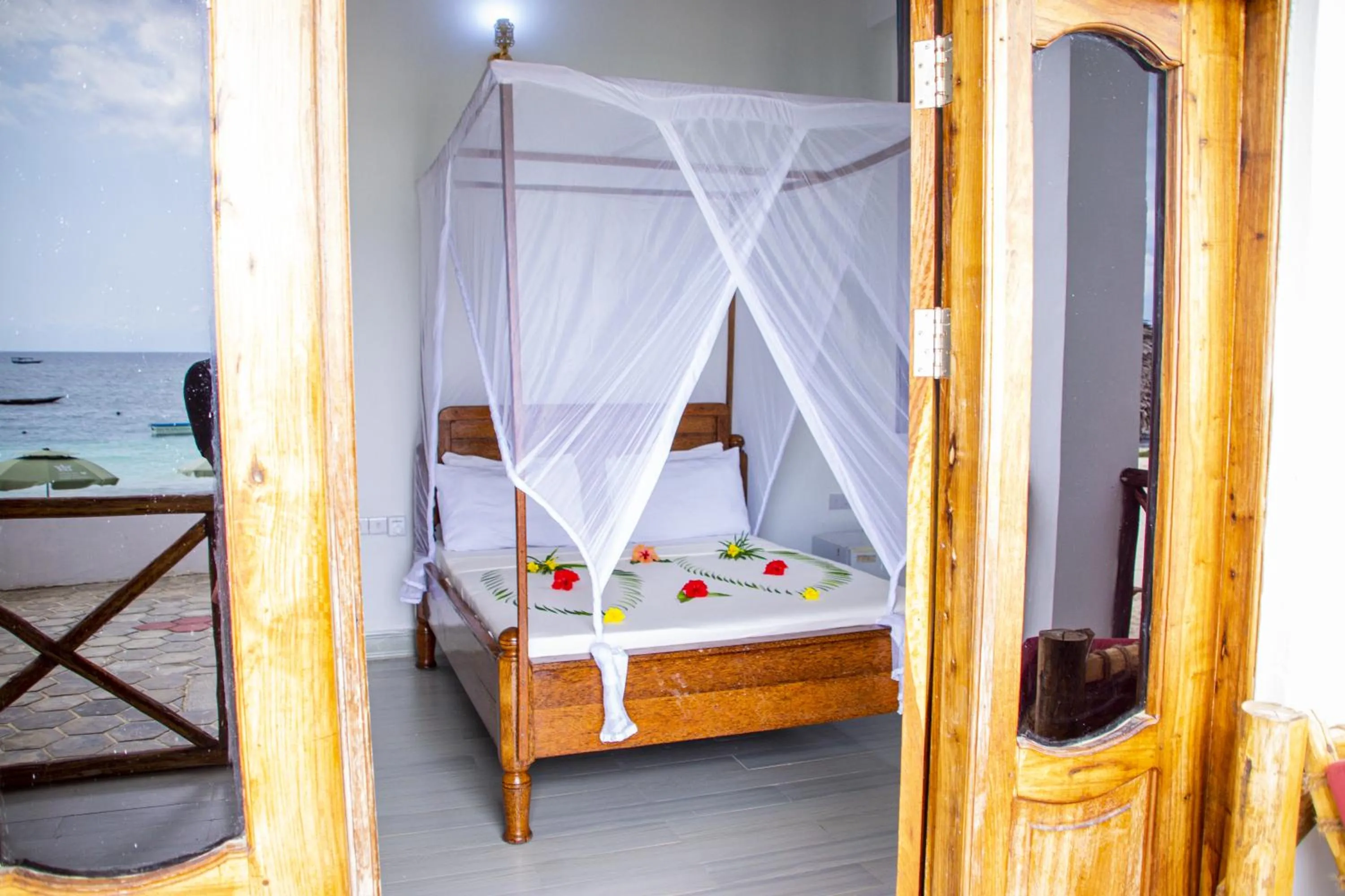Photo of the whole room, Bed in Amazing Beach Hotel Zanzibar