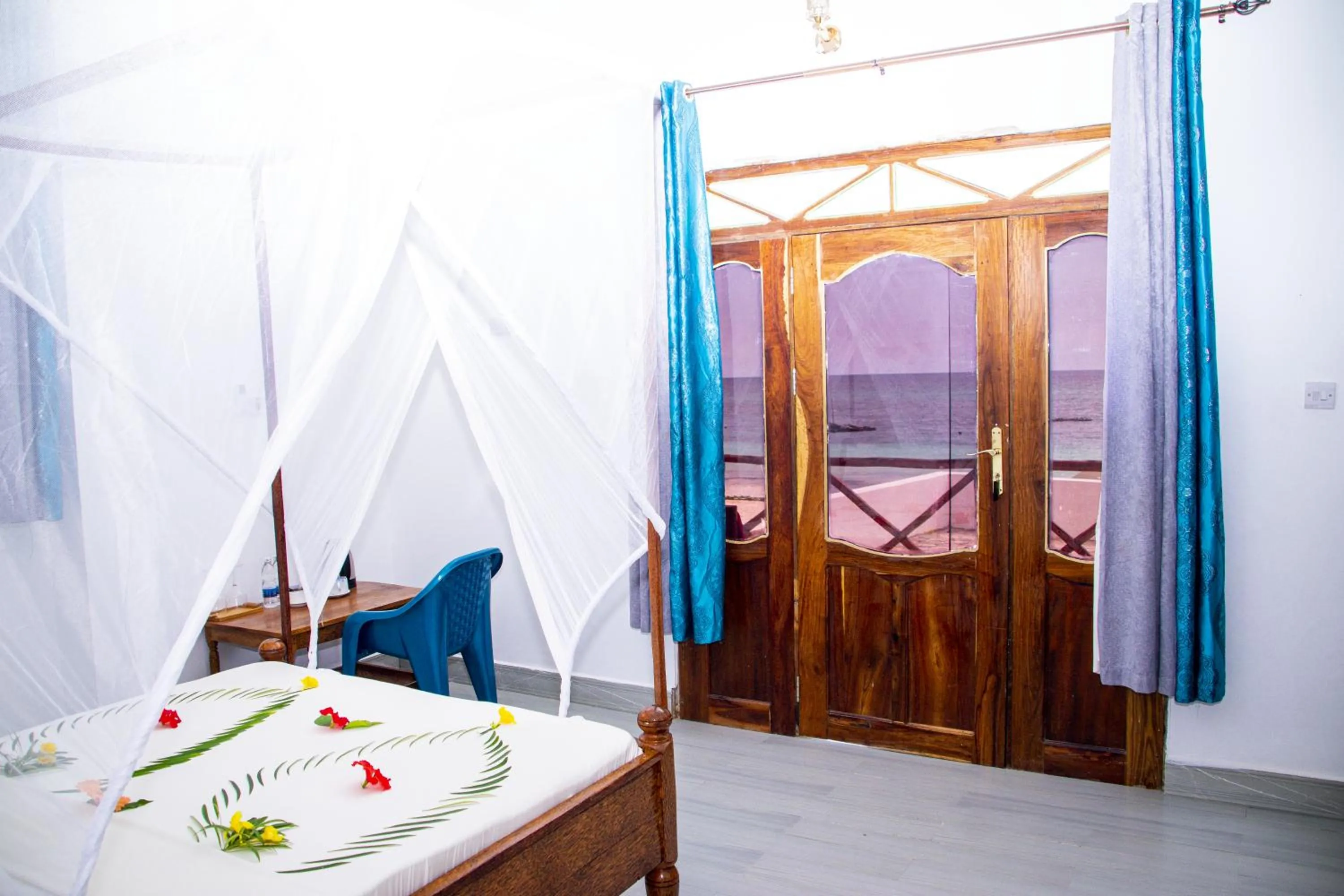 Bed in Amazing Beach Hotel Zanzibar