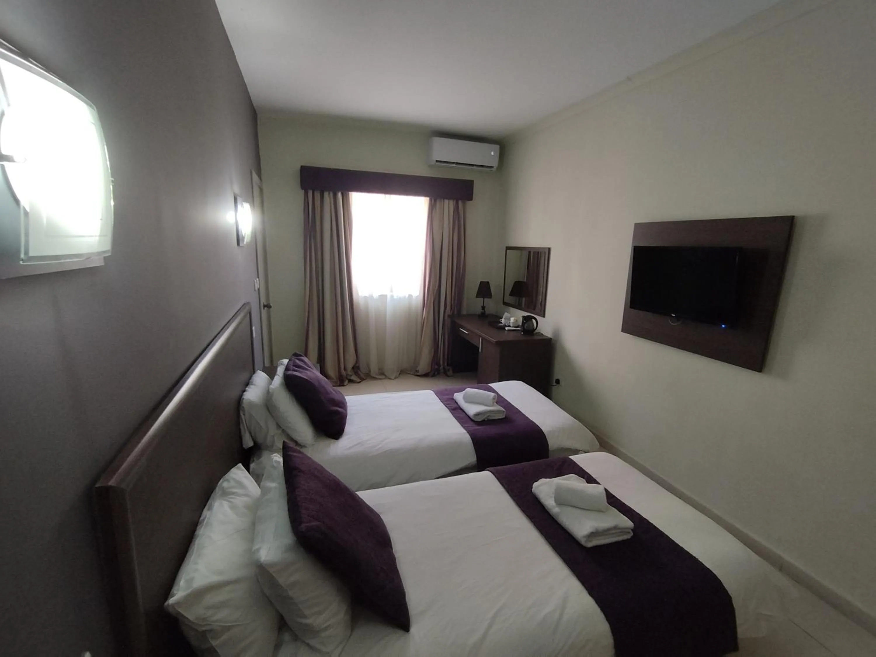 Bed in The Windsor Hotel