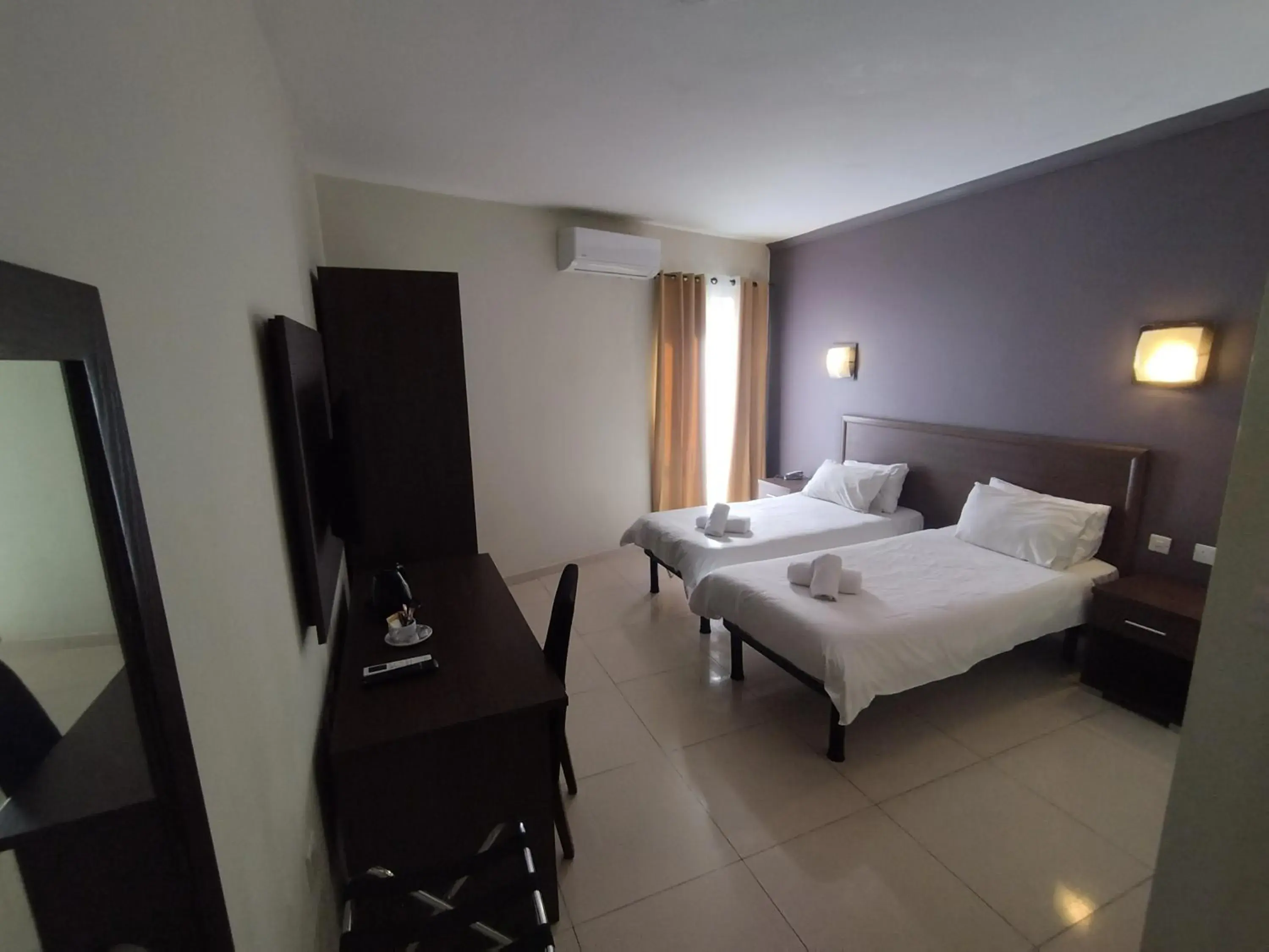 Bed in The Windsor Hotel Bed in The Windsor Hotel