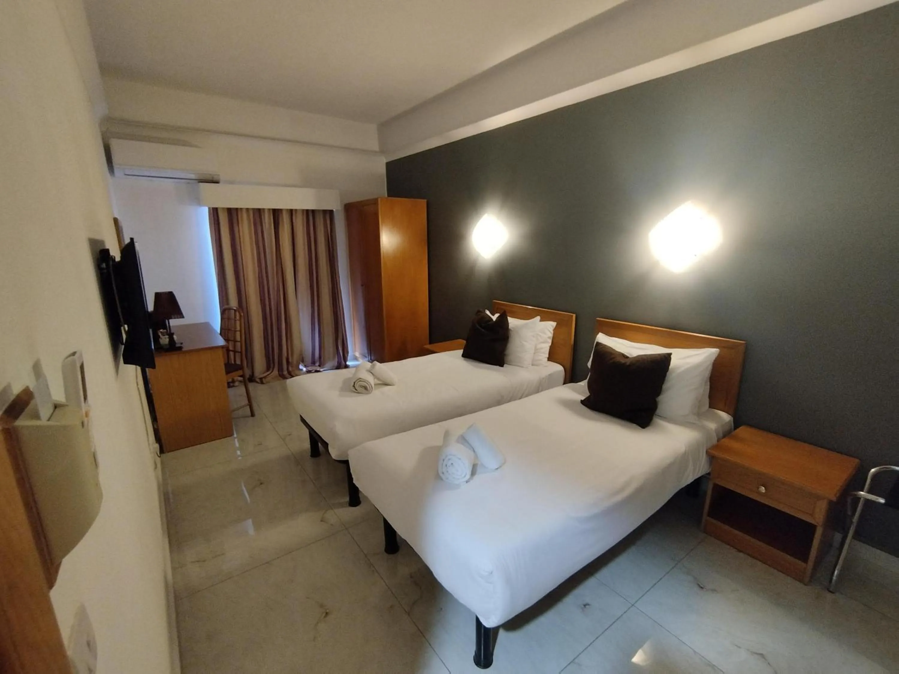 Bed in The Windsor Hotel