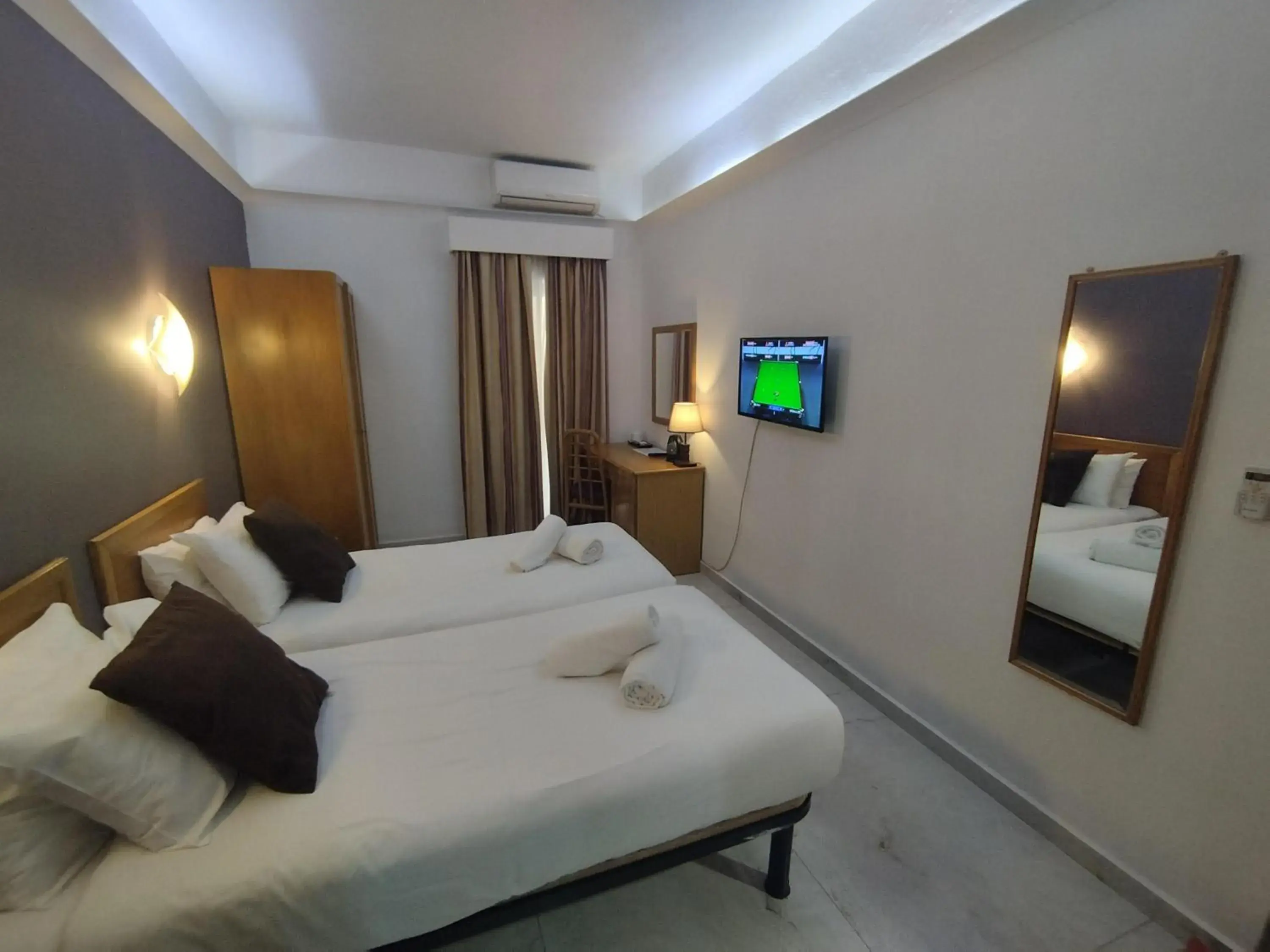 Bed in The Windsor Hotel Bed in The Windsor Hotel