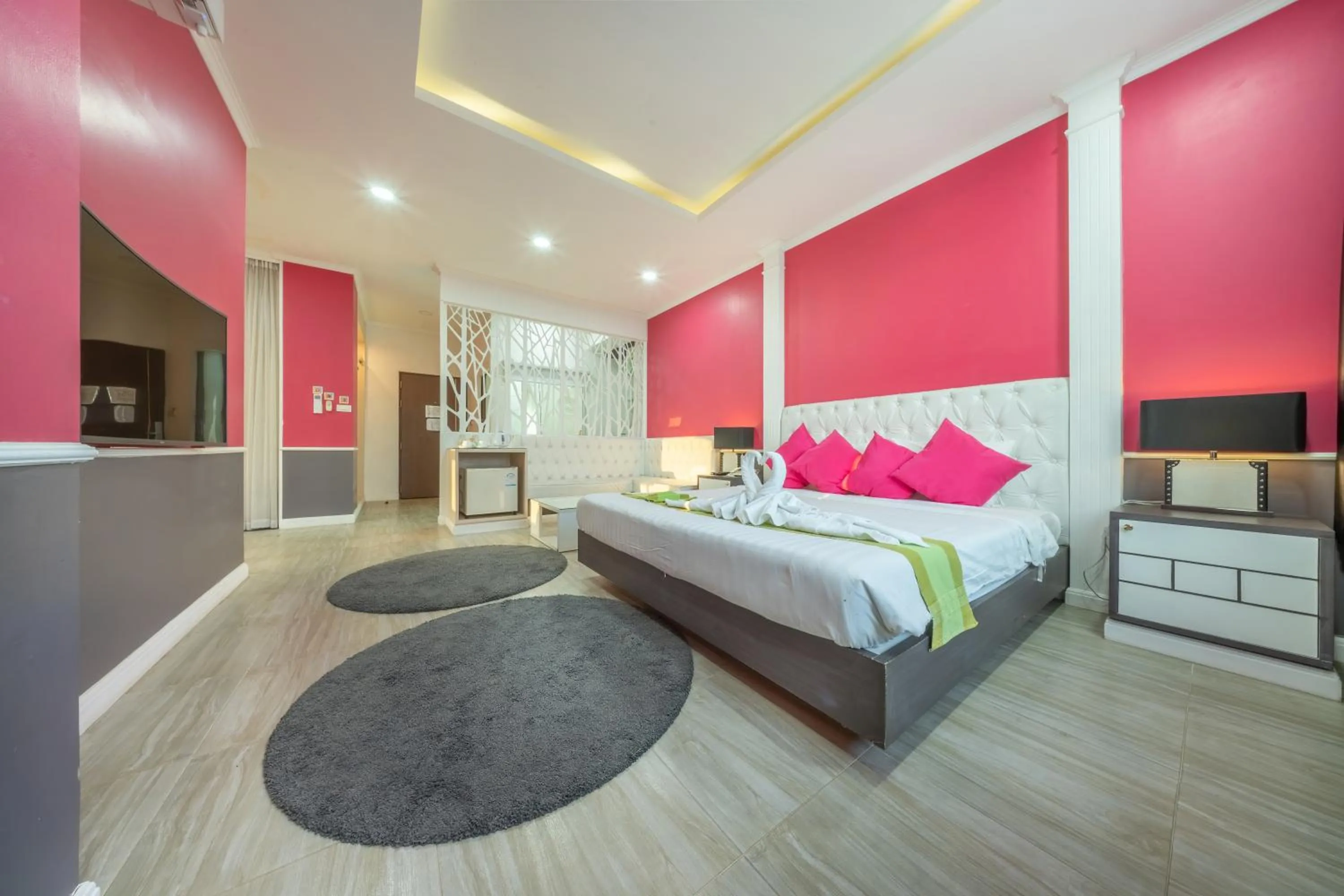 Bed in SHIN Hotel V-ONE Korat