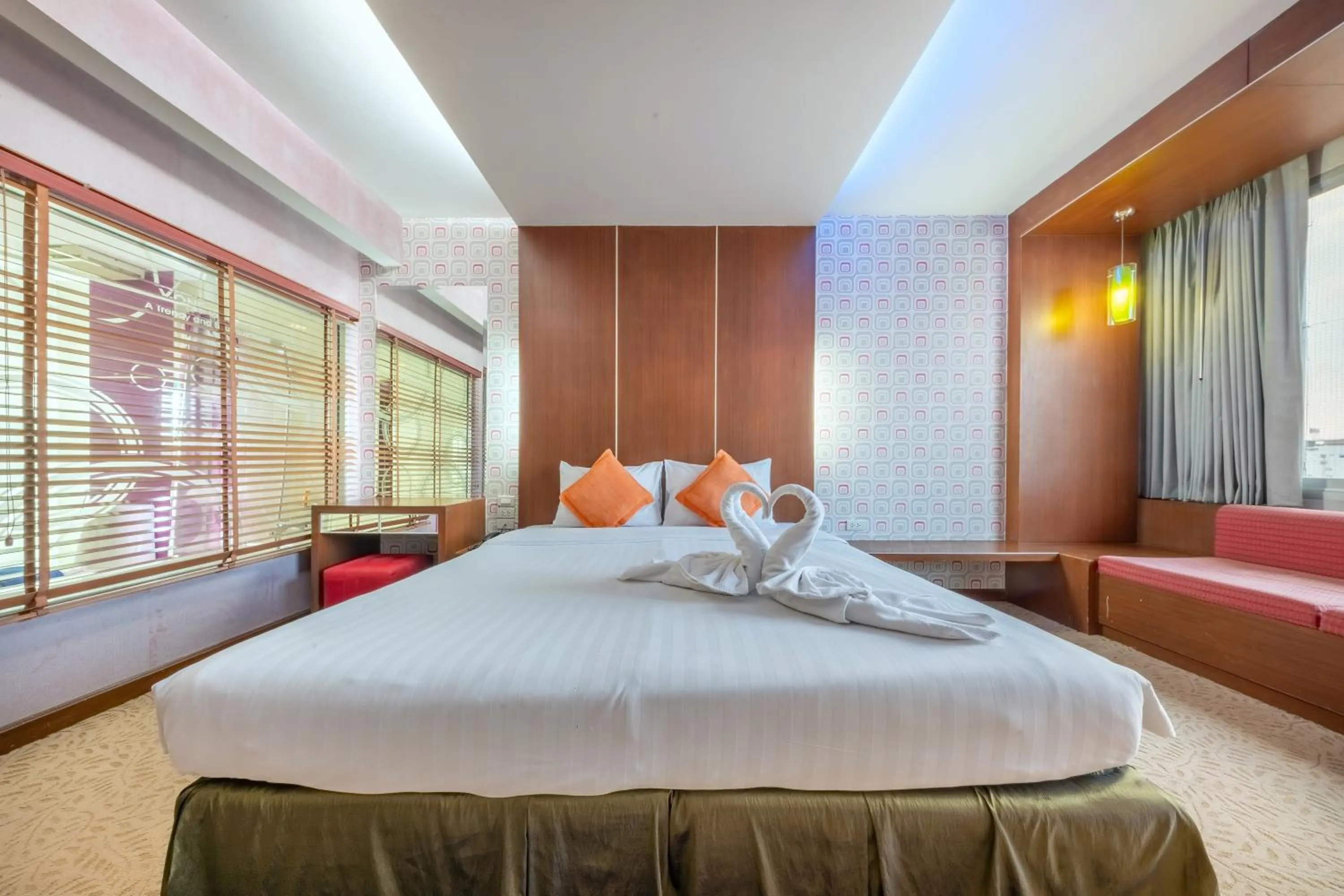 Bed in SHIN Hotel V-ONE Korat