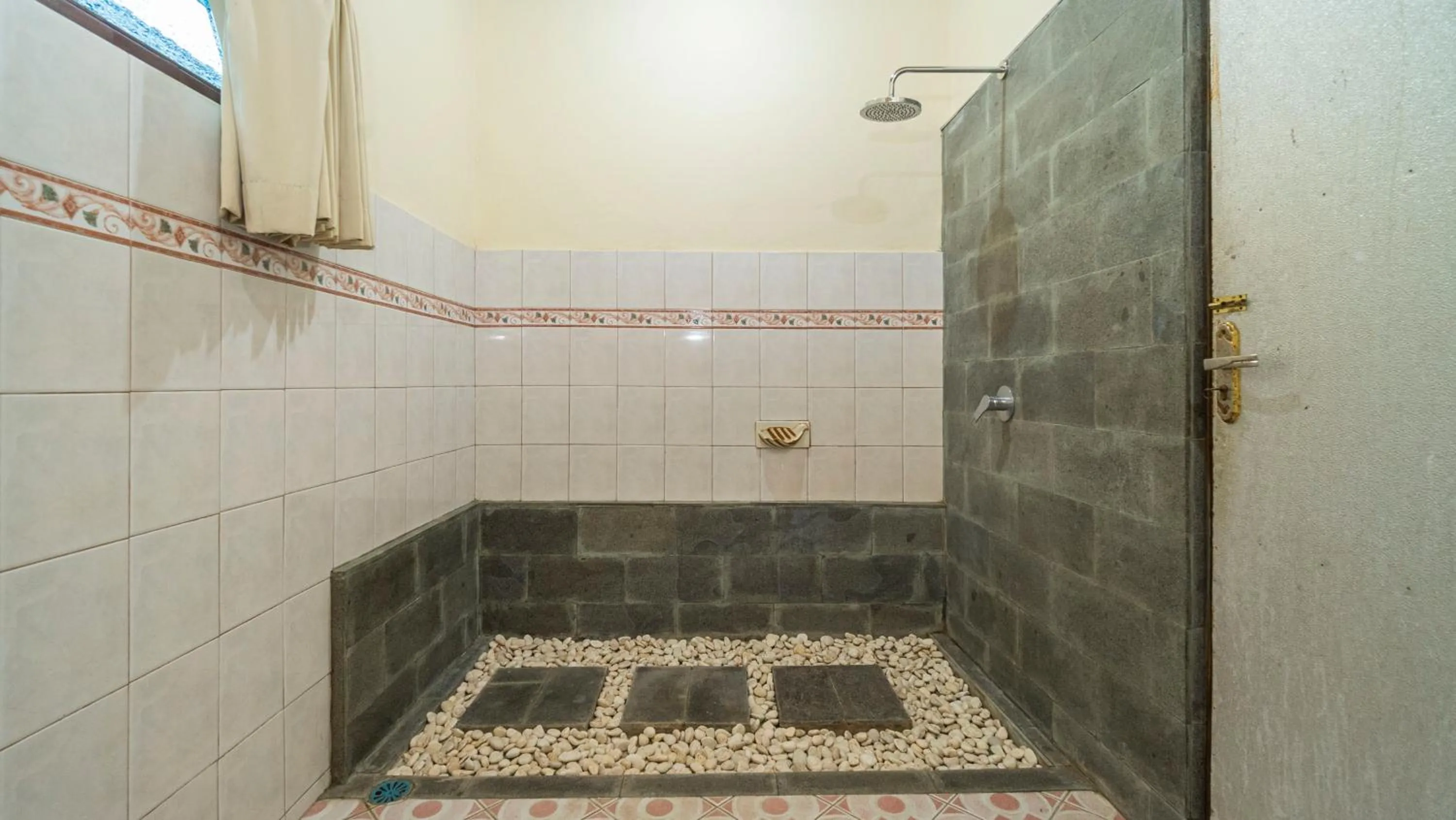 Shower in Raka House Accommodation