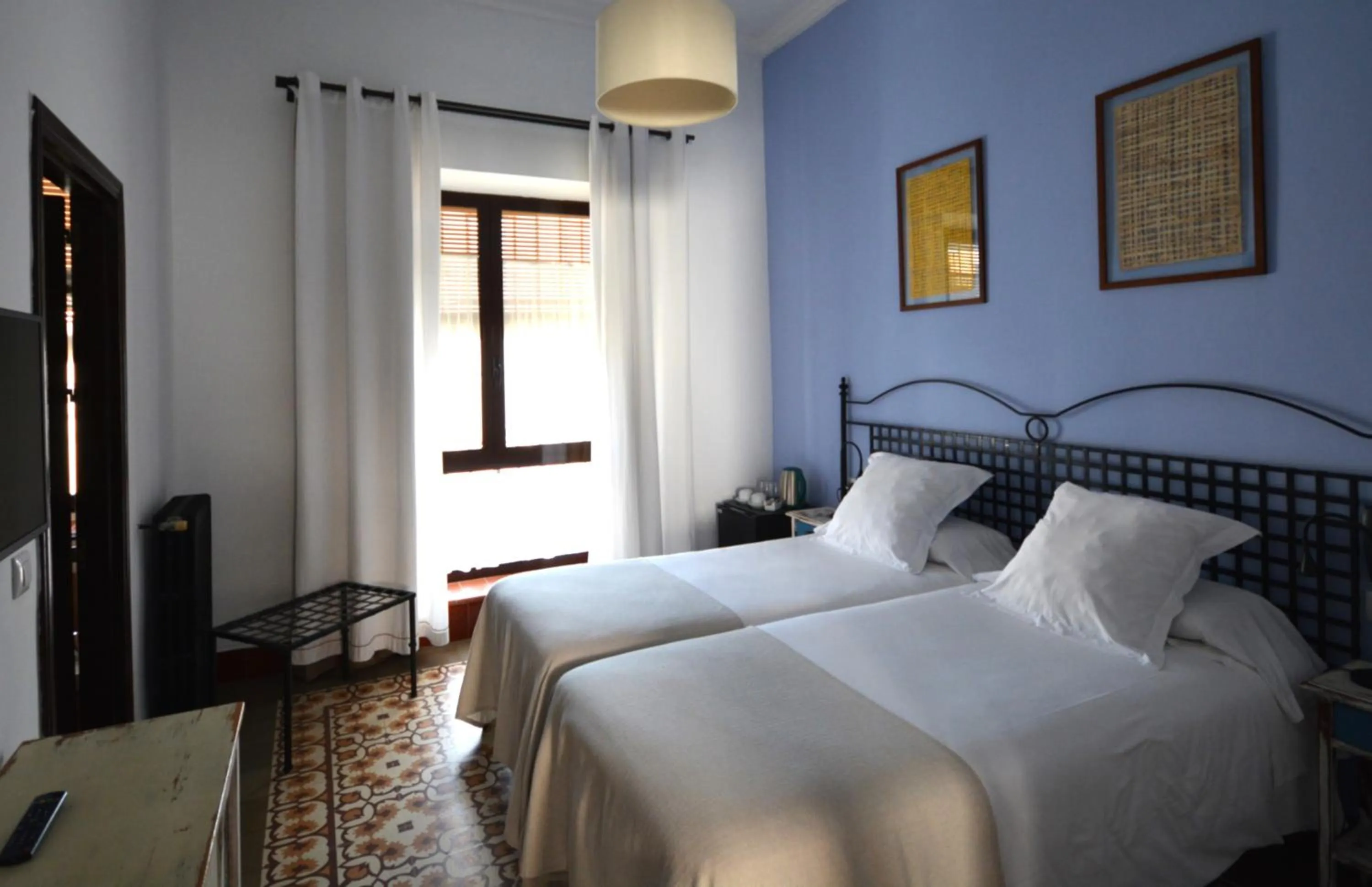 Bed in Hotel Casa de los Azulejos