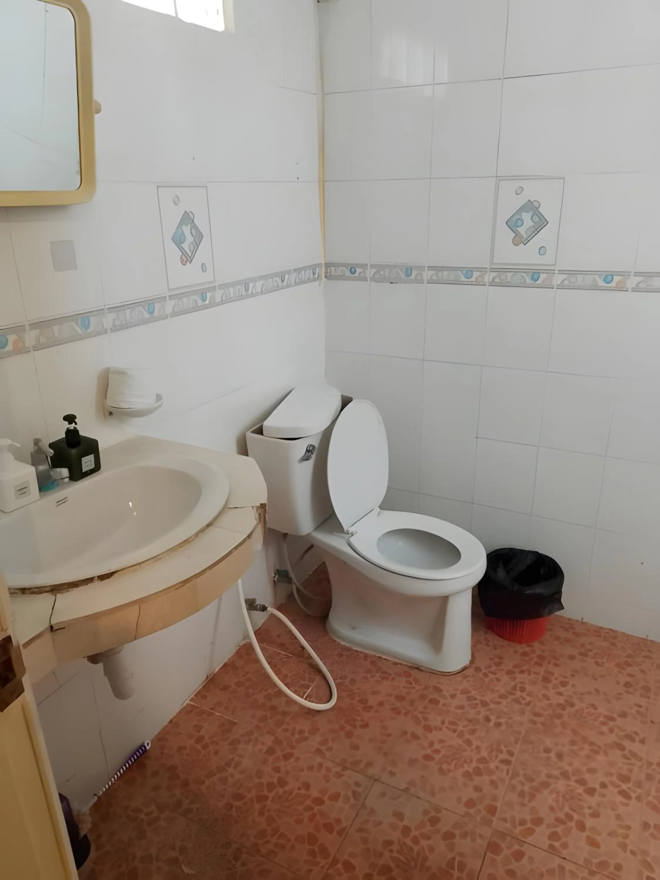 Toilet in XX GO INN Phuket Patong Beach