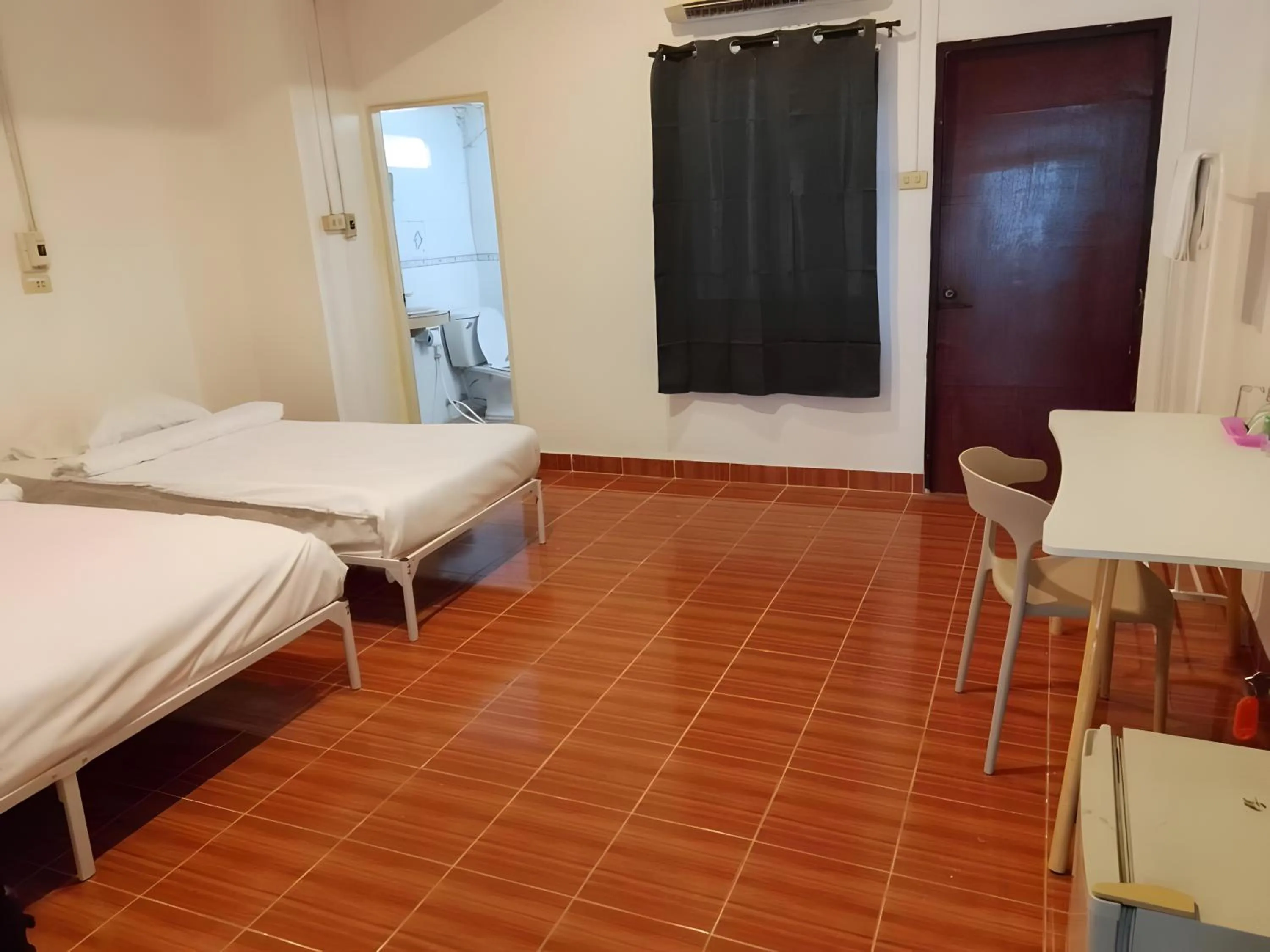 Bed in XX GO INN Phuket Patong Beach