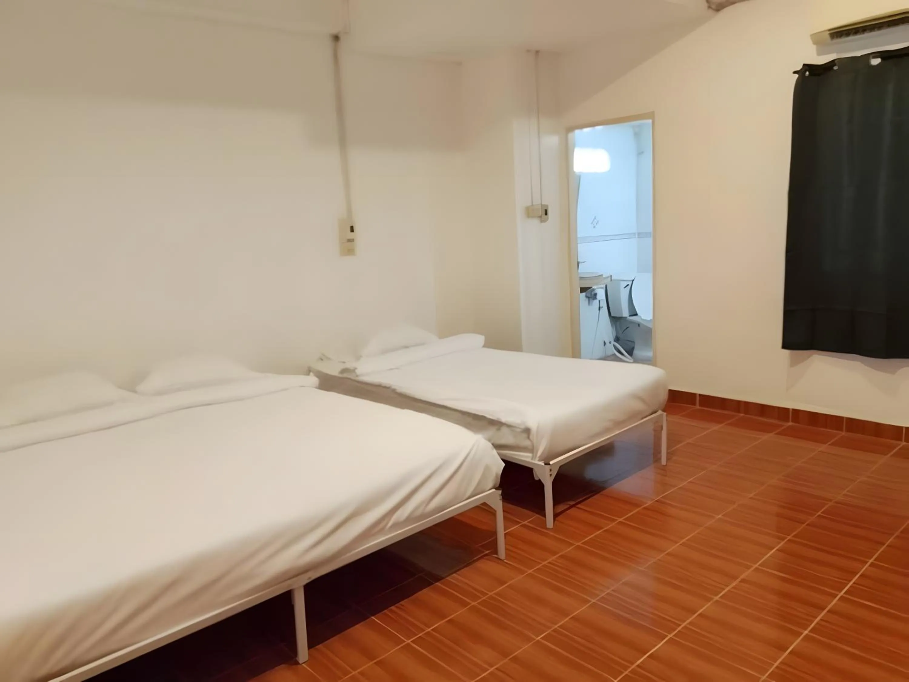 Bed in XX GO INN Phuket Patong Beach