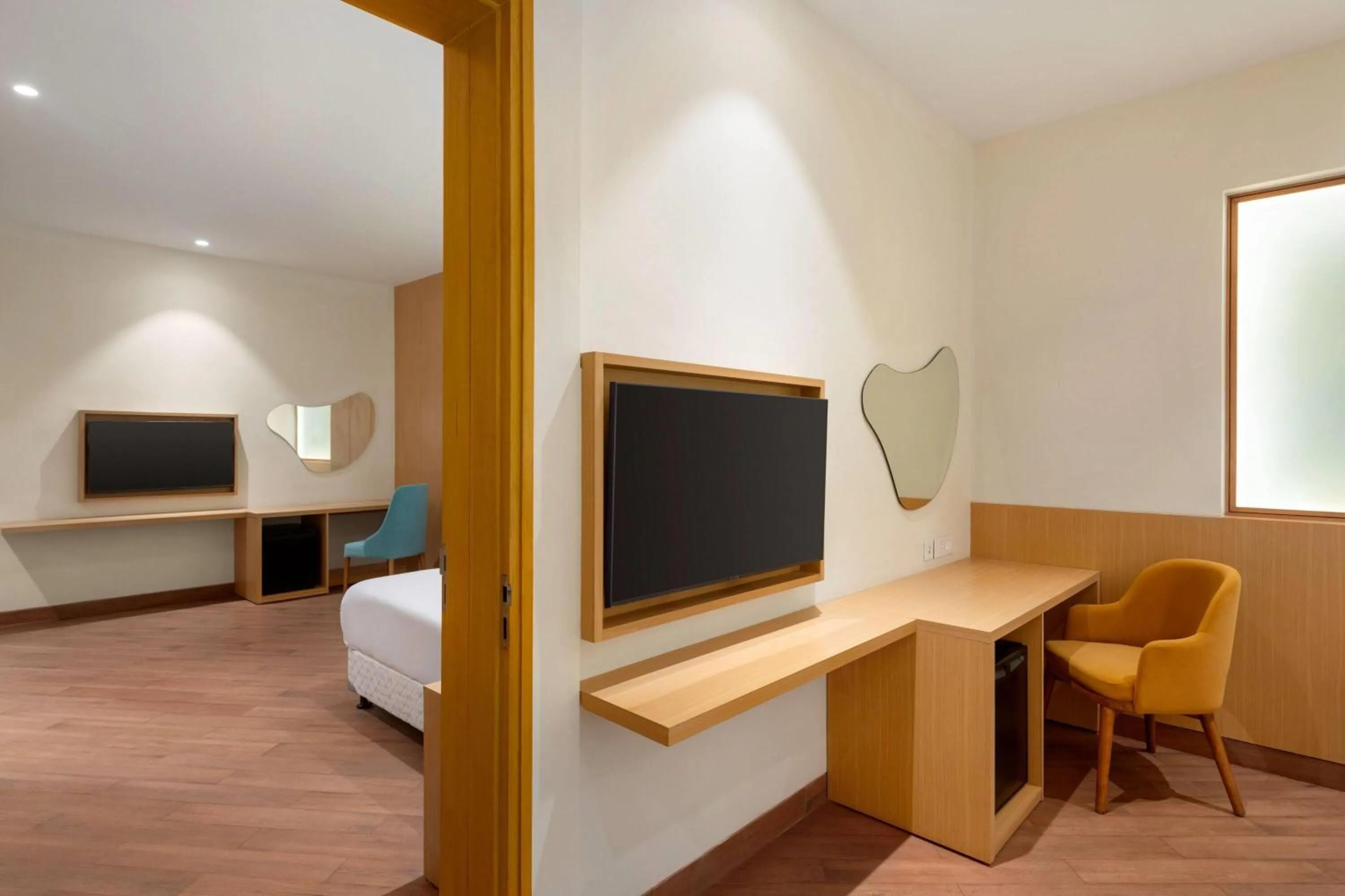 Photo of the whole room, Bed in Ramada Encore by Wyndham Lucknow Airport