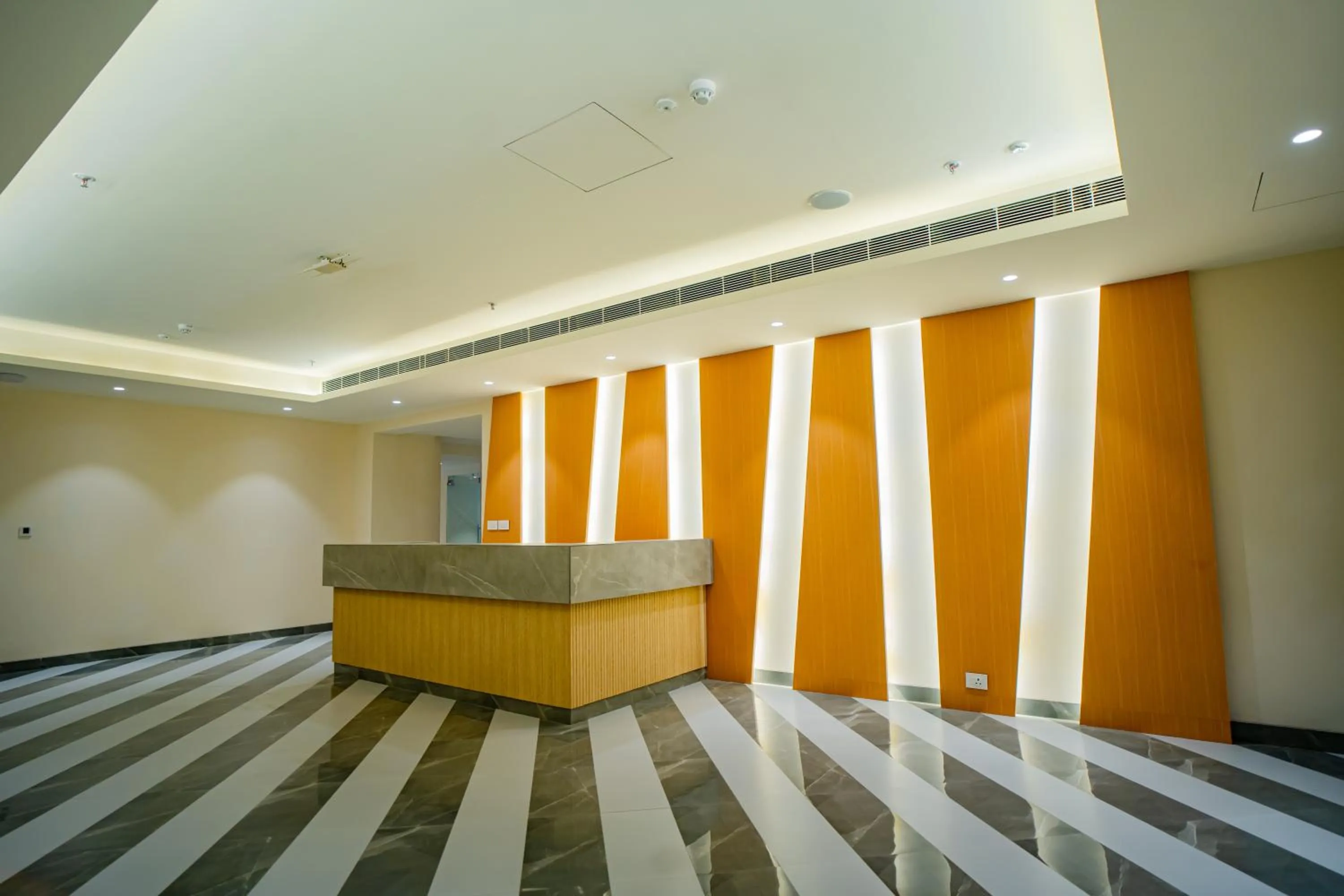 Lobby or reception in Ramada Encore by Wyndham Lucknow Airport