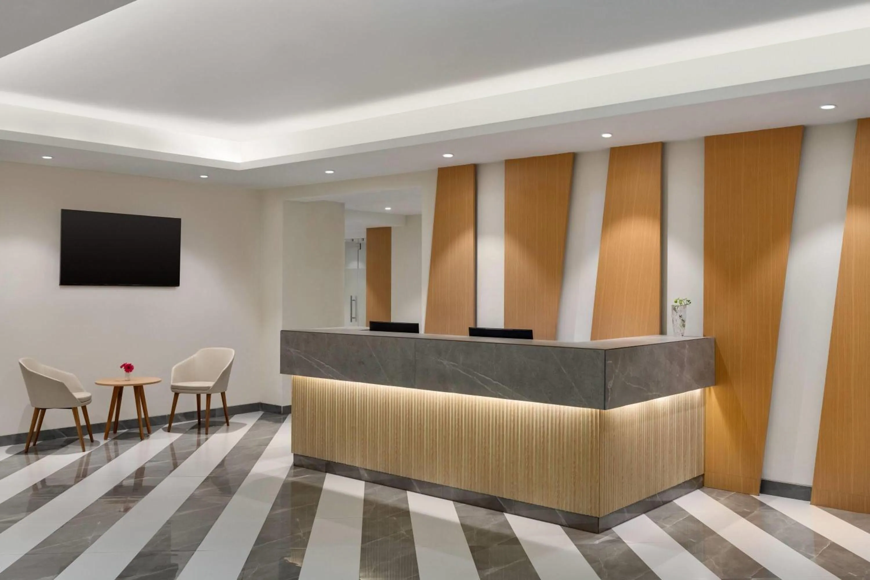 Lobby or reception in Ramada Encore by Wyndham Lucknow Airport