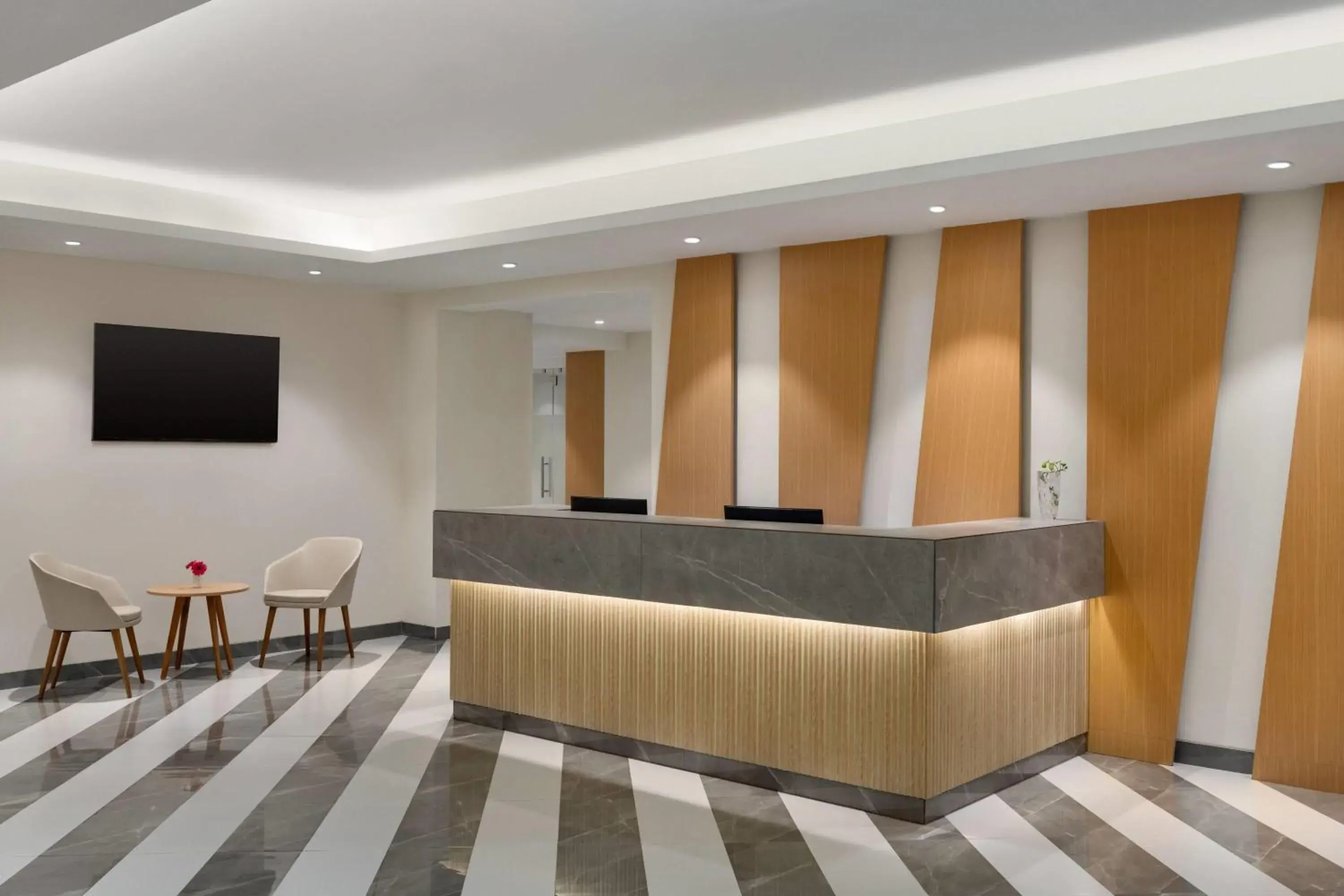 Lobby or reception in Ramada Encore by Wyndham Lucknow Airport Lobby or reception in Ramada Encore by Wyndham Lucknow Airport
