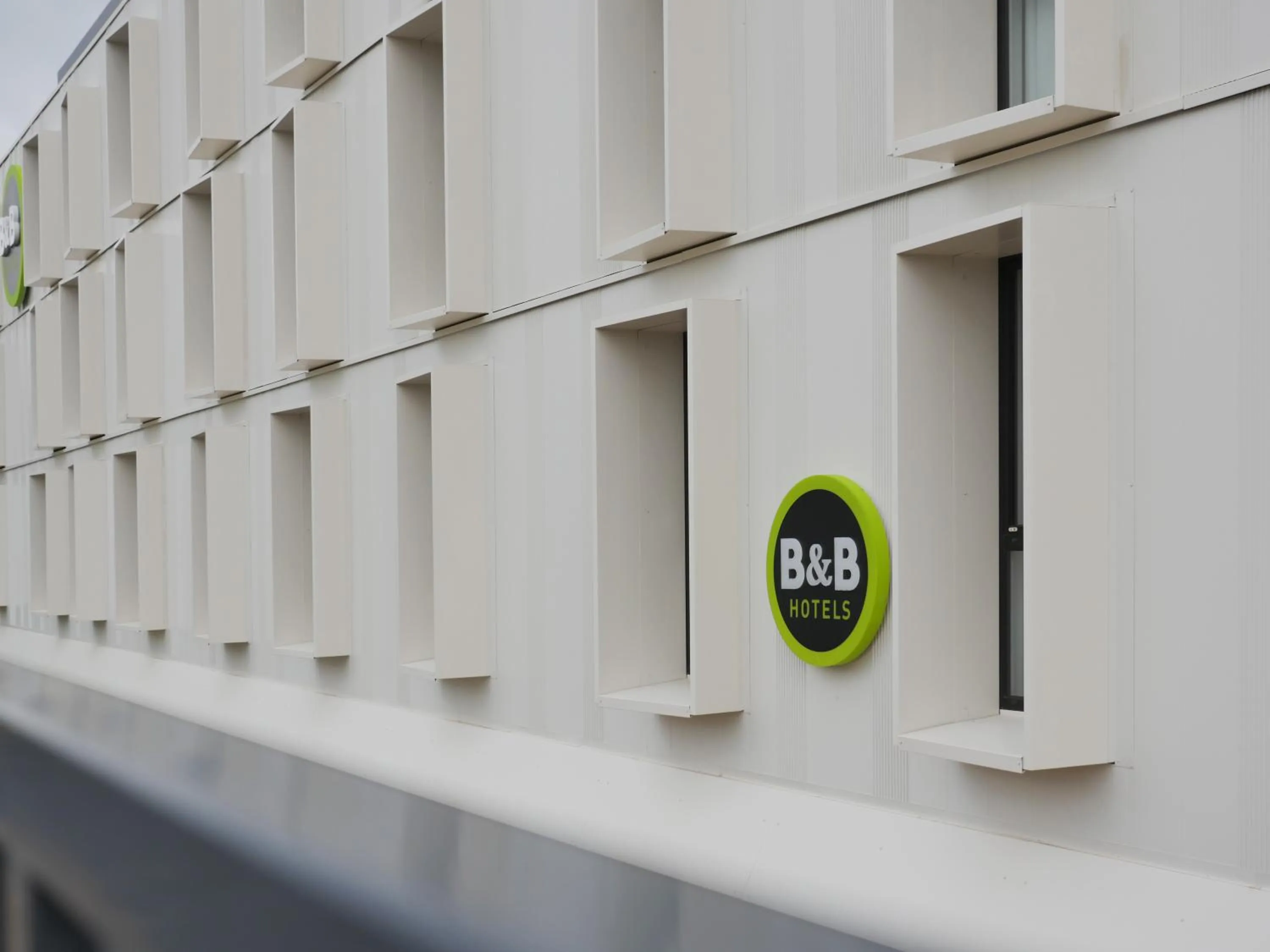 Property logo or sign in B&B HOTEL Carcassonne Rocadest La Cité