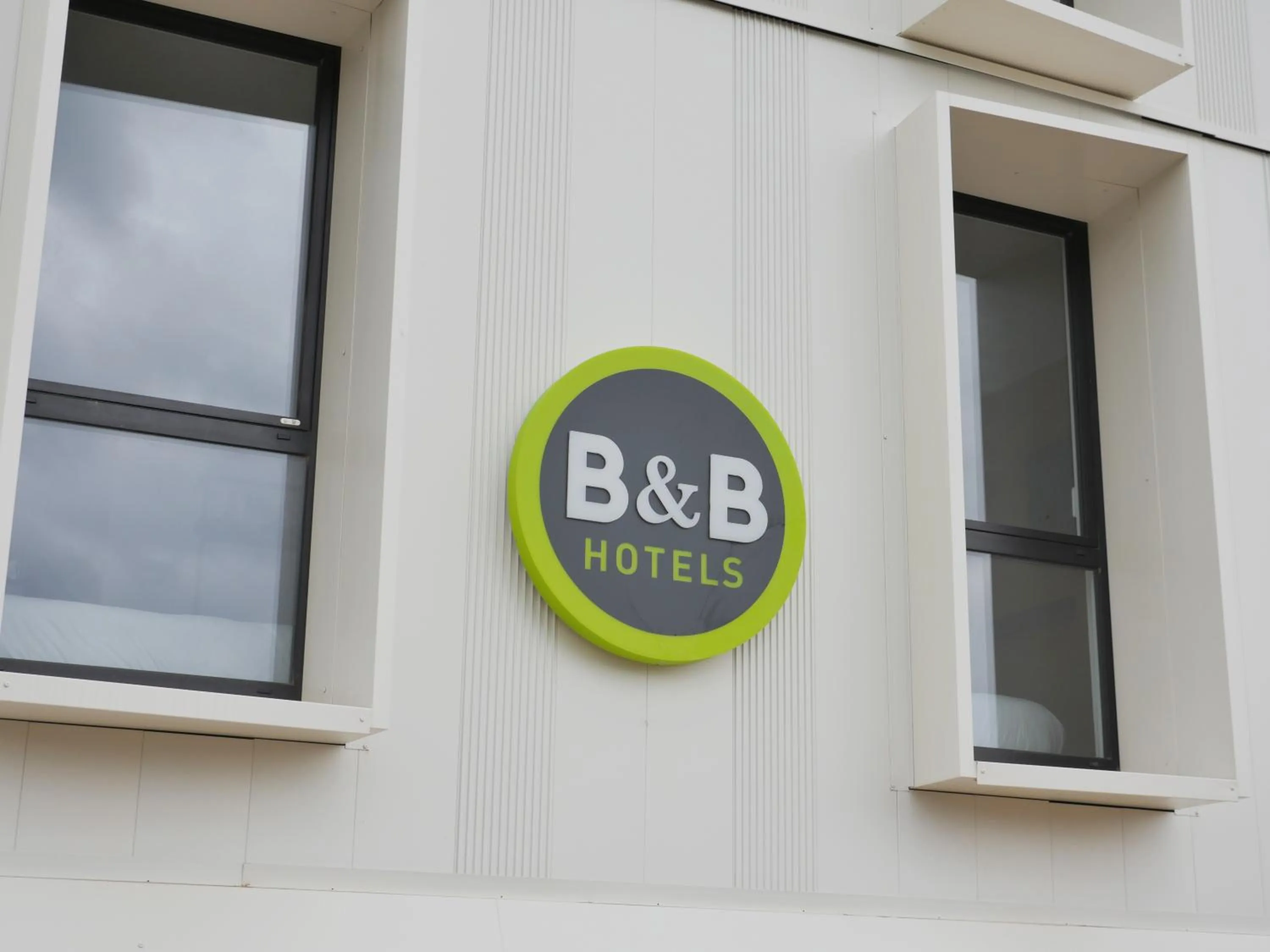 Property logo or sign in B&B HOTEL Carcassonne Rocadest La Cité