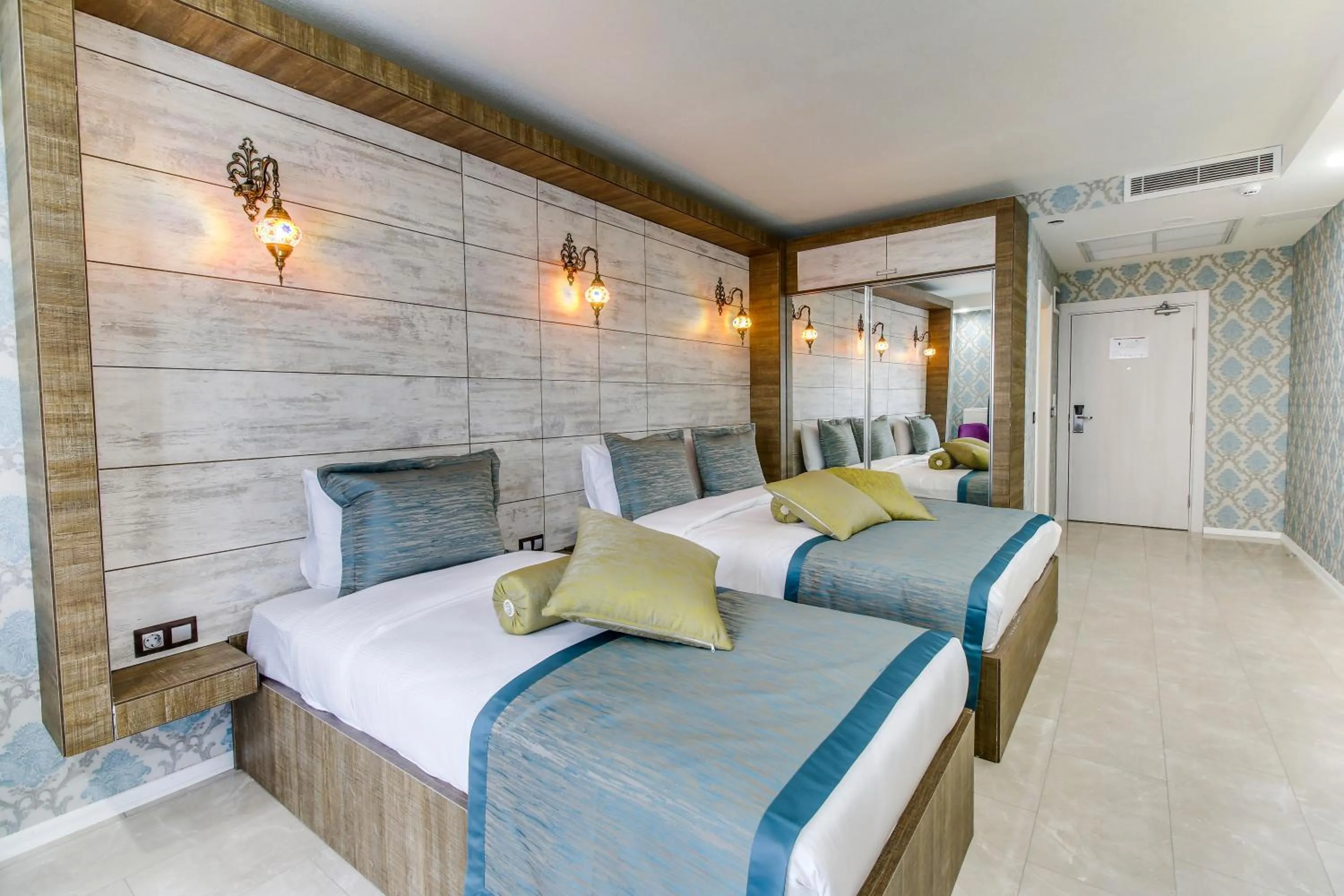 Trendy Room with 1 Queen + 1 Single Bed in Elite World Nest Sivas