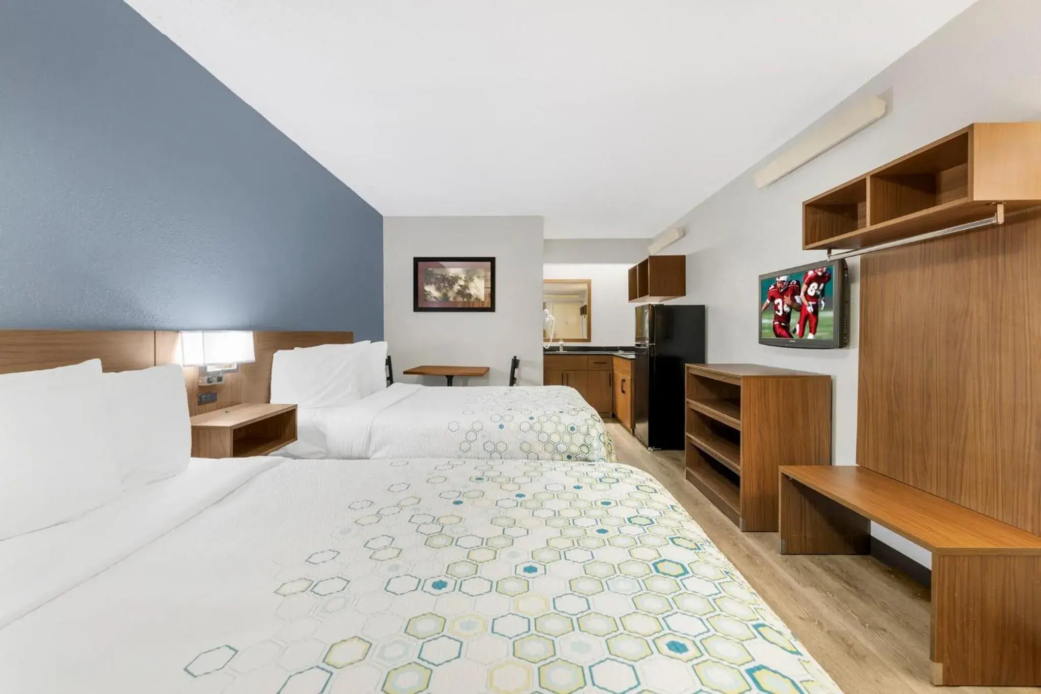 Photo of the whole room, Bed in HomeTowne Studios by Red Roof Buffalo - Niagara Airport Photo of the whole room, Bed in HomeTowne Studios by Red Roof Buffalo - Niagara Airport