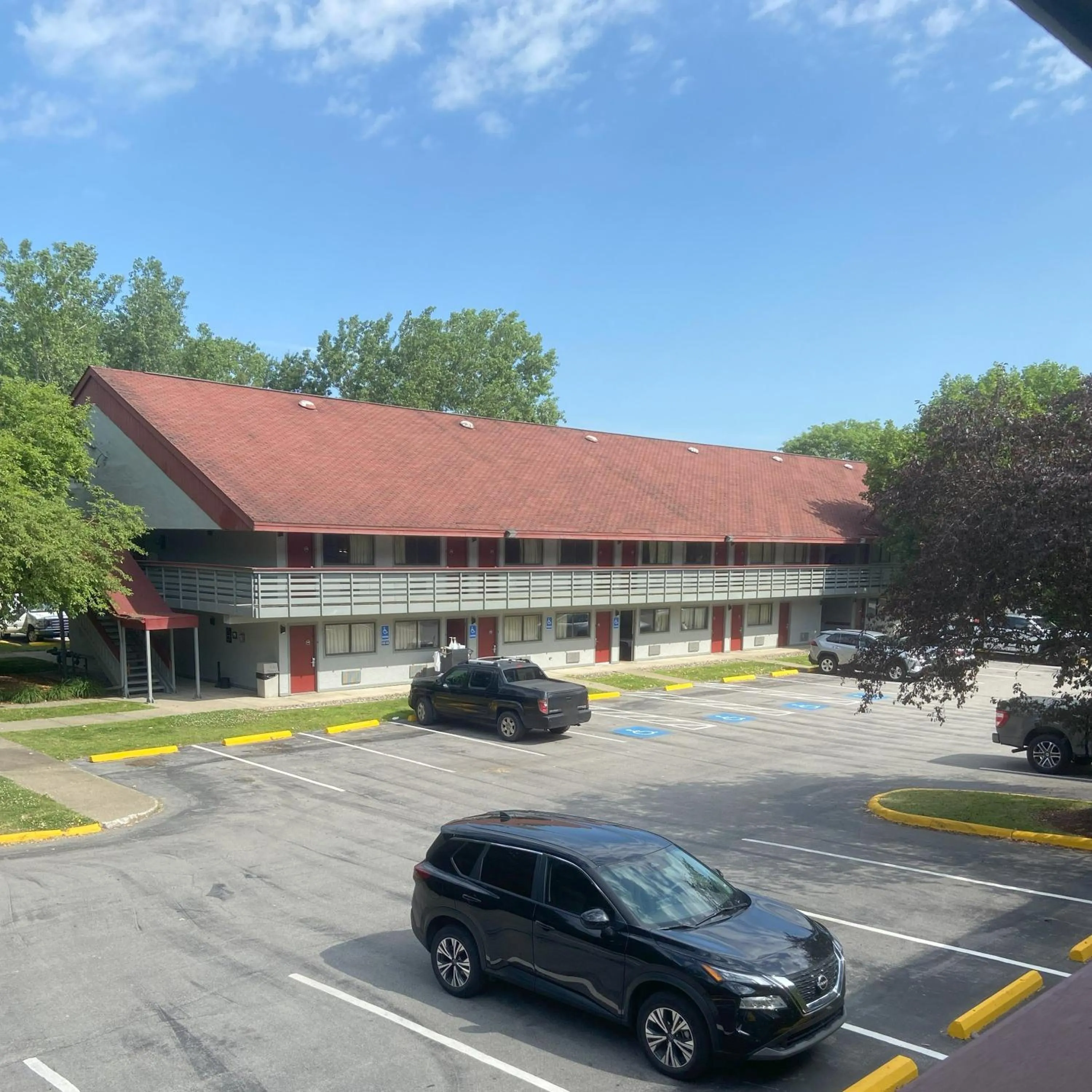 Property building in HomeTowne Studios by Red Roof Buffalo - Niagara Airport