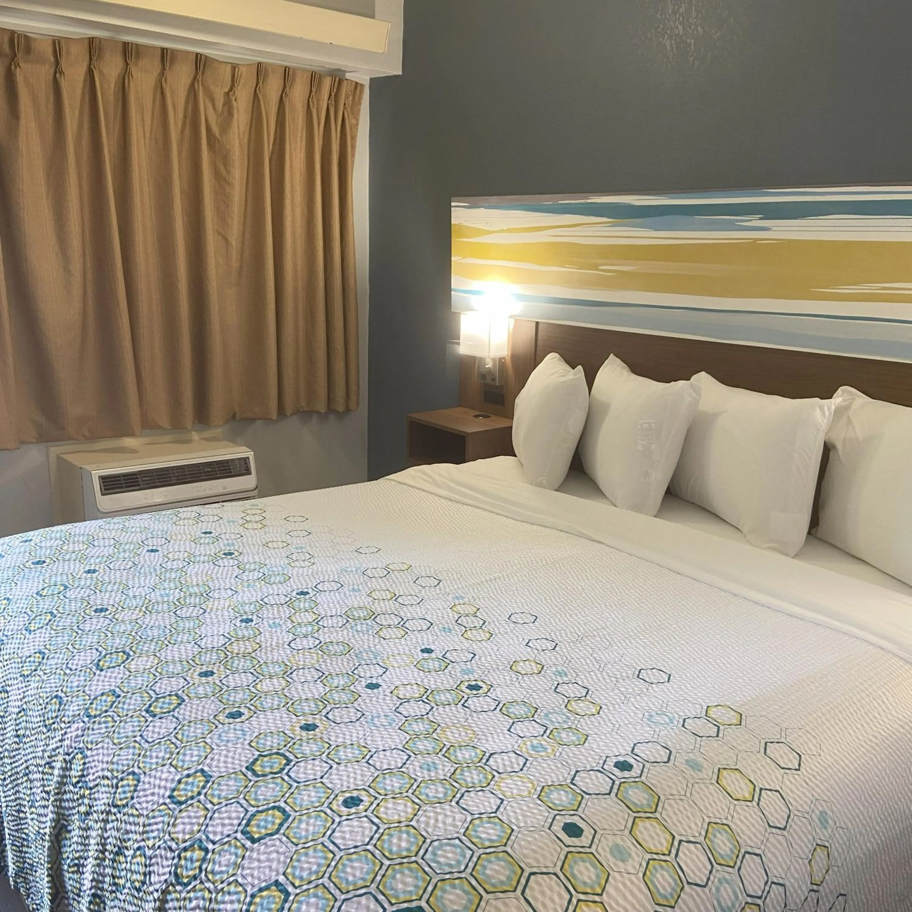 Bed in HomeTowne Studios by Red Roof Buffalo - Niagara Airport