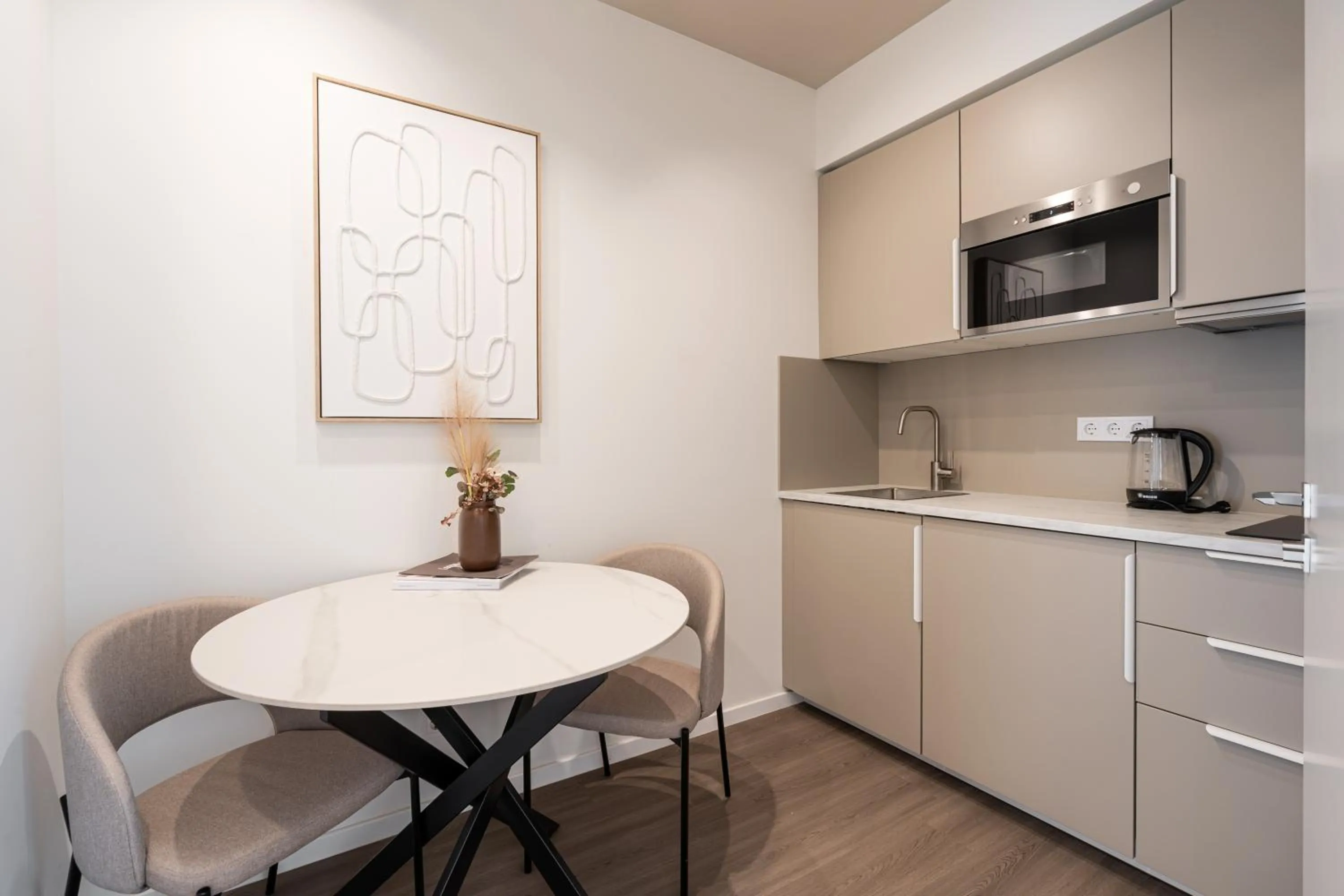 Kitchen or kitchenette in Oasis Luxe Boutique Suites by BQA