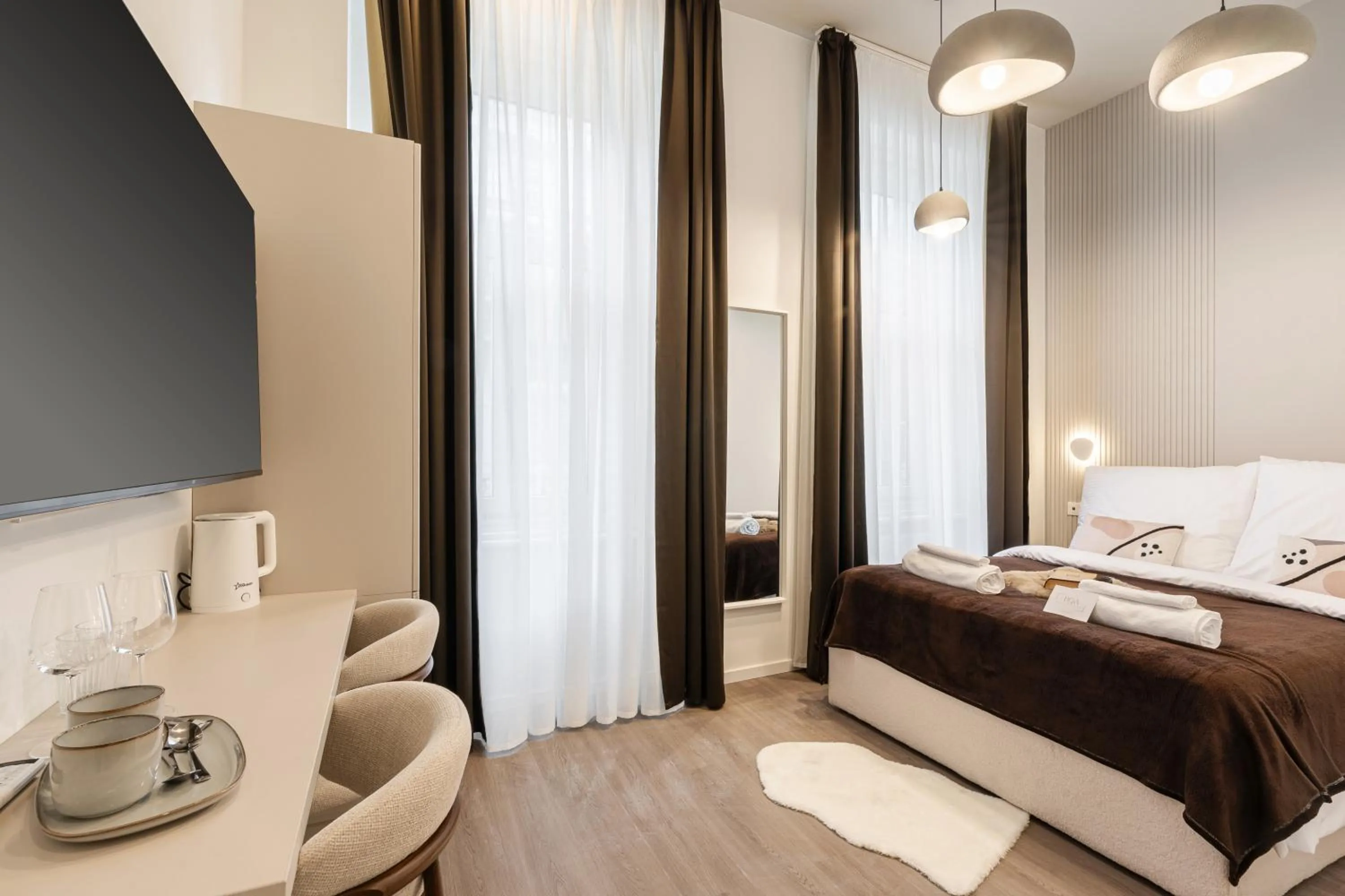 Bed in Oasis Luxe Boutique Suites by BQA