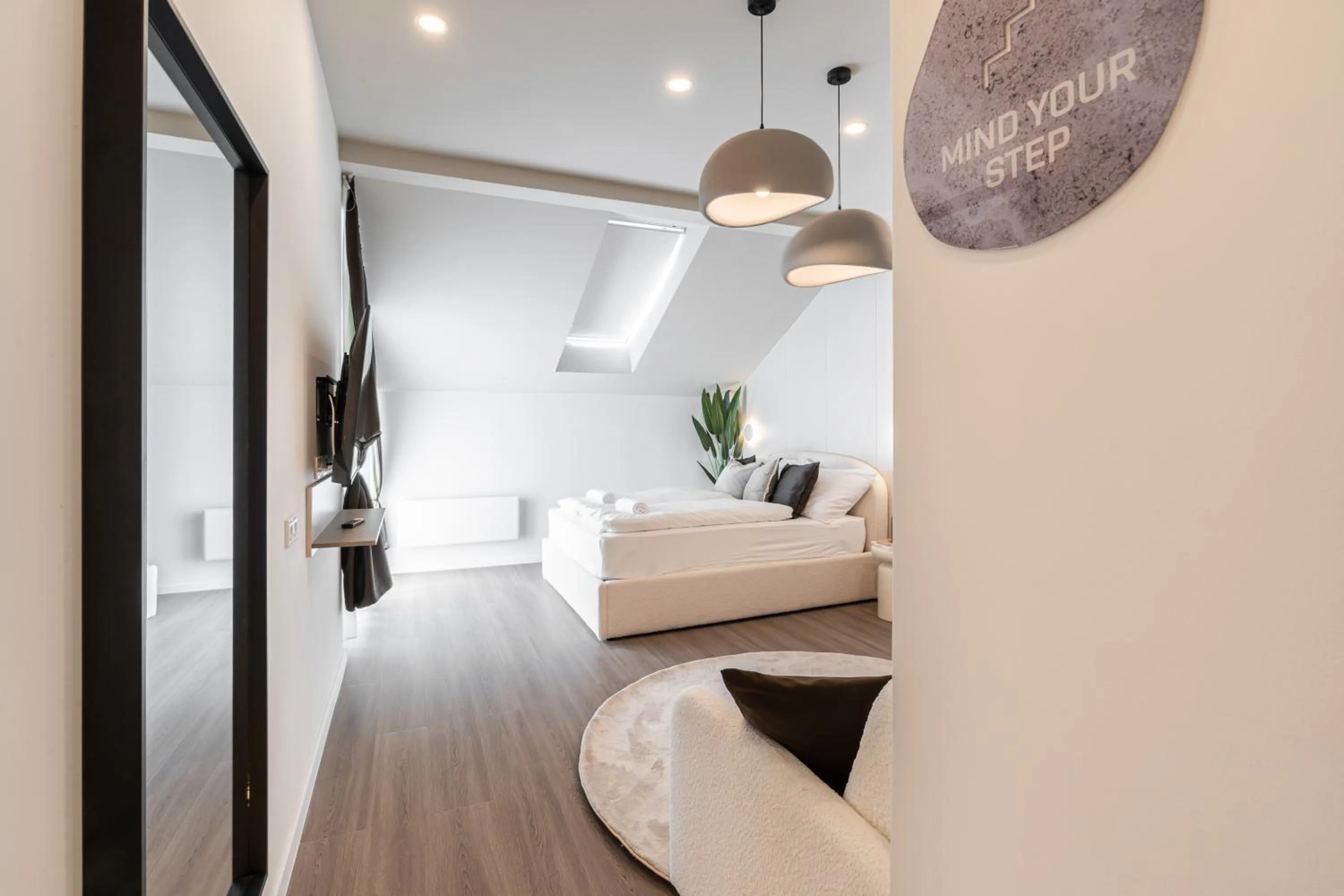 Bed in Oasis Luxe Boutique Suites by BQA