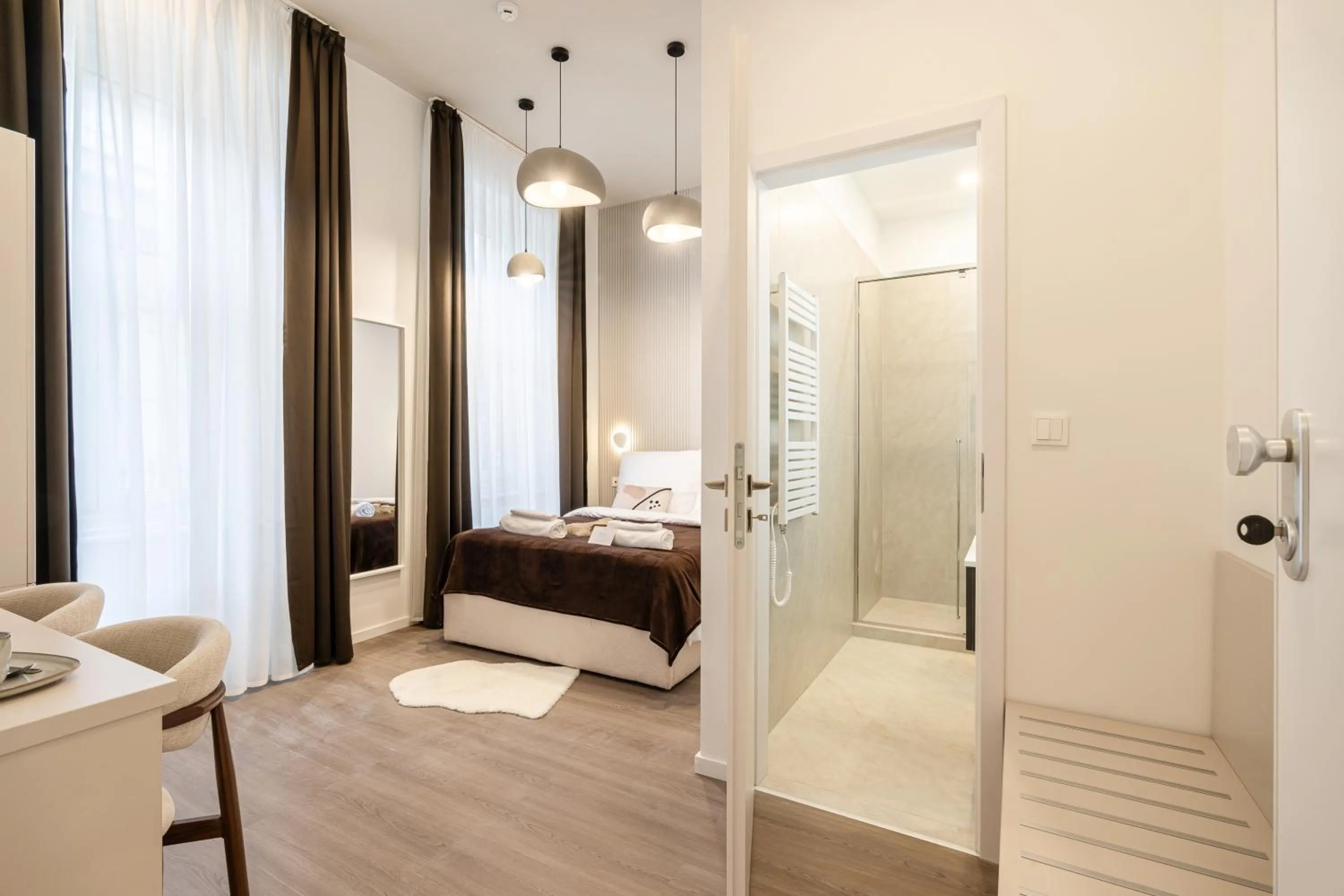 Bed in Oasis Luxe Boutique Suites by BQA