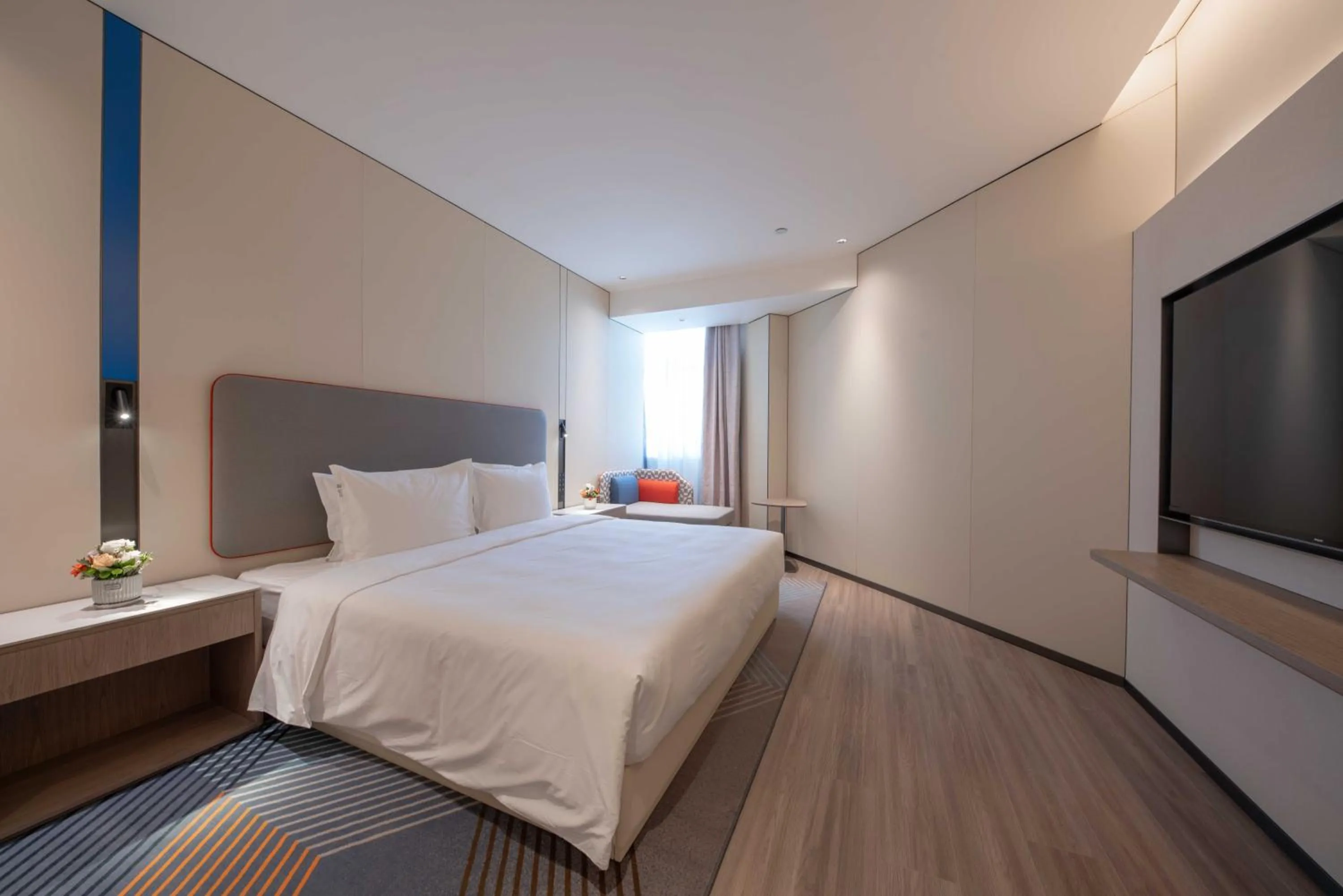 Bed in Holiday Inn Express Turpan, an IHG Hotel