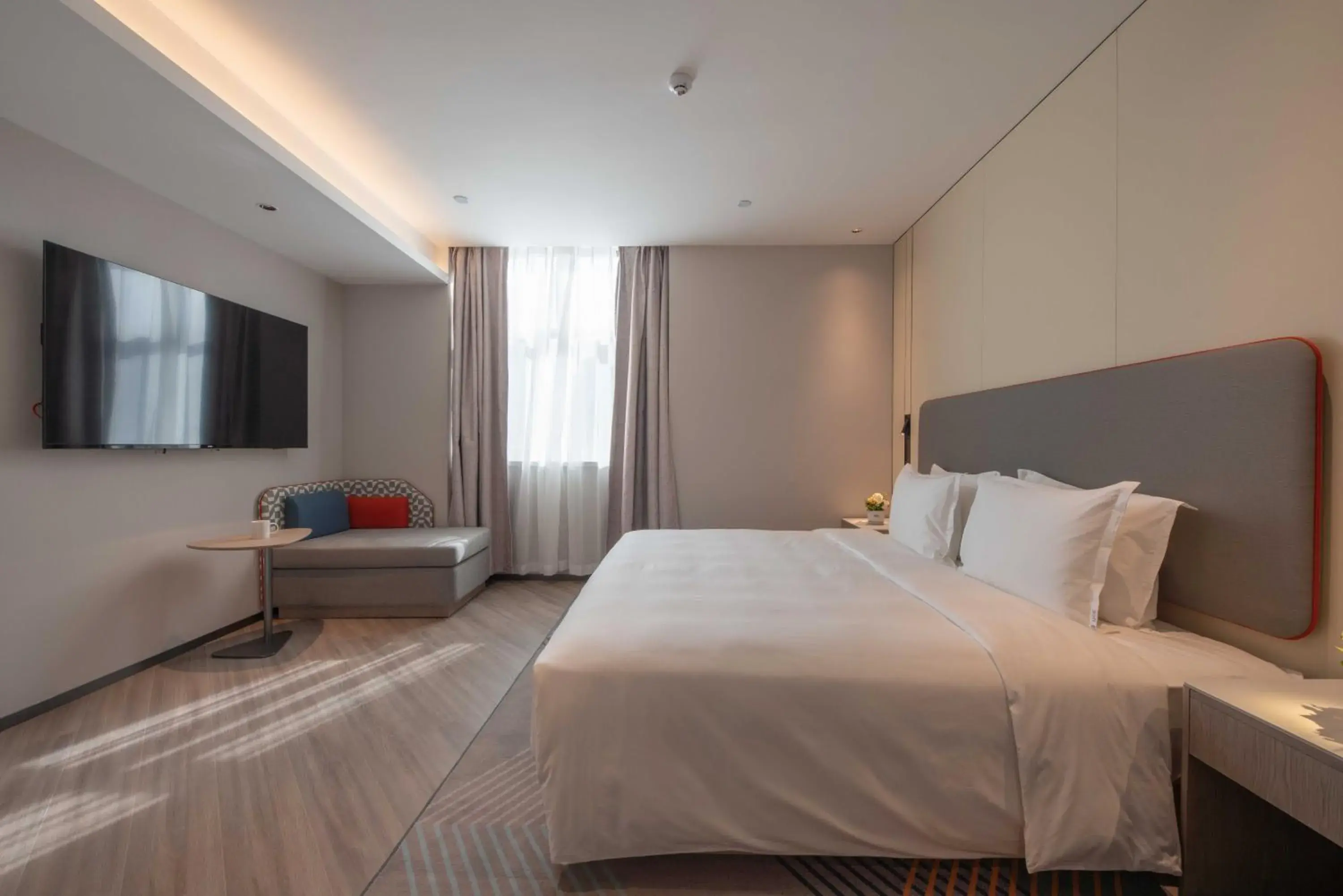 Bed in Holiday Inn Express Turpan, an IHG Hotel Bed in Holiday Inn Express Turpan, an IHG Hotel