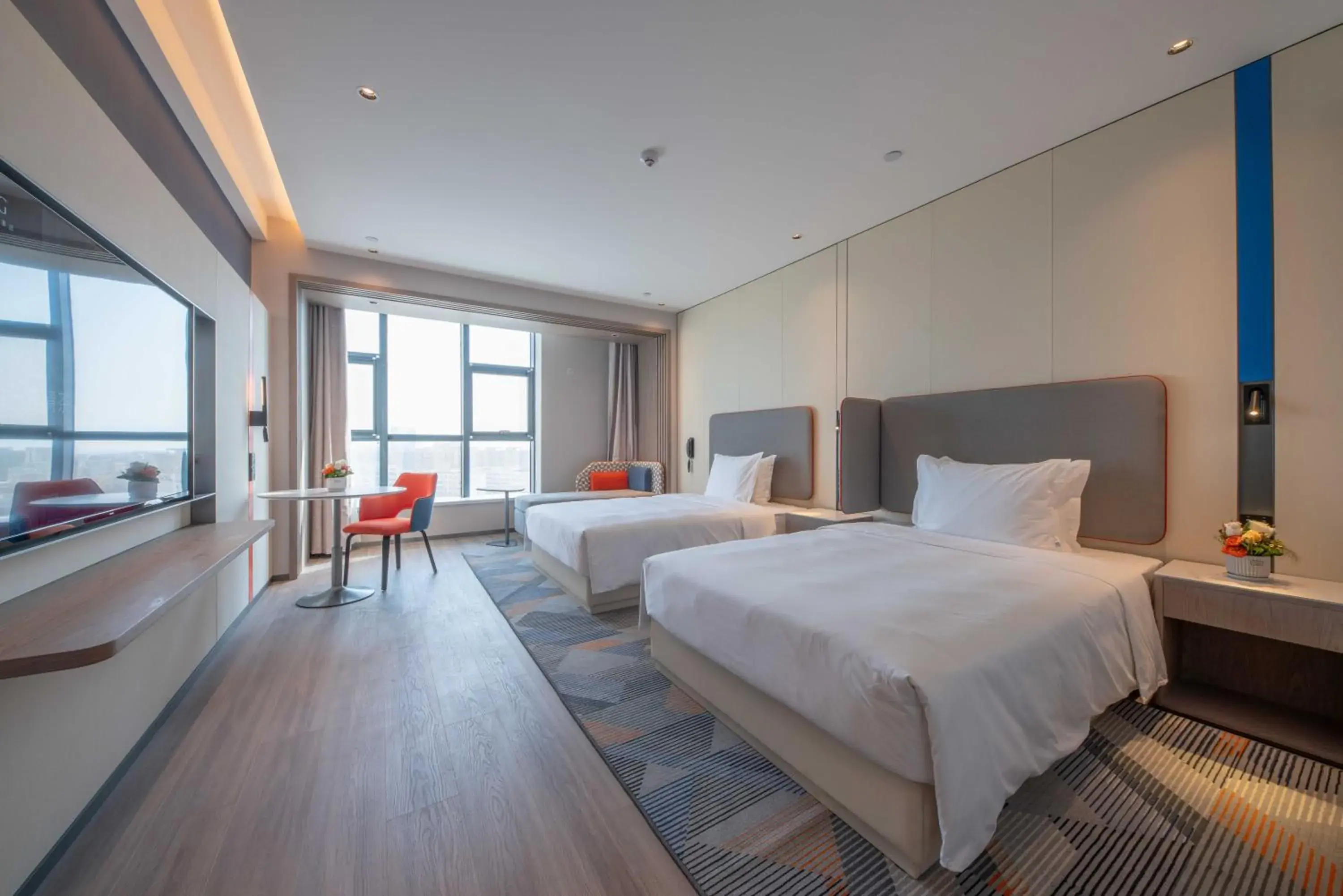 Bed in Holiday Inn Express Turpan, an IHG Hotel Bed in Holiday Inn Express Turpan, an IHG Hotel