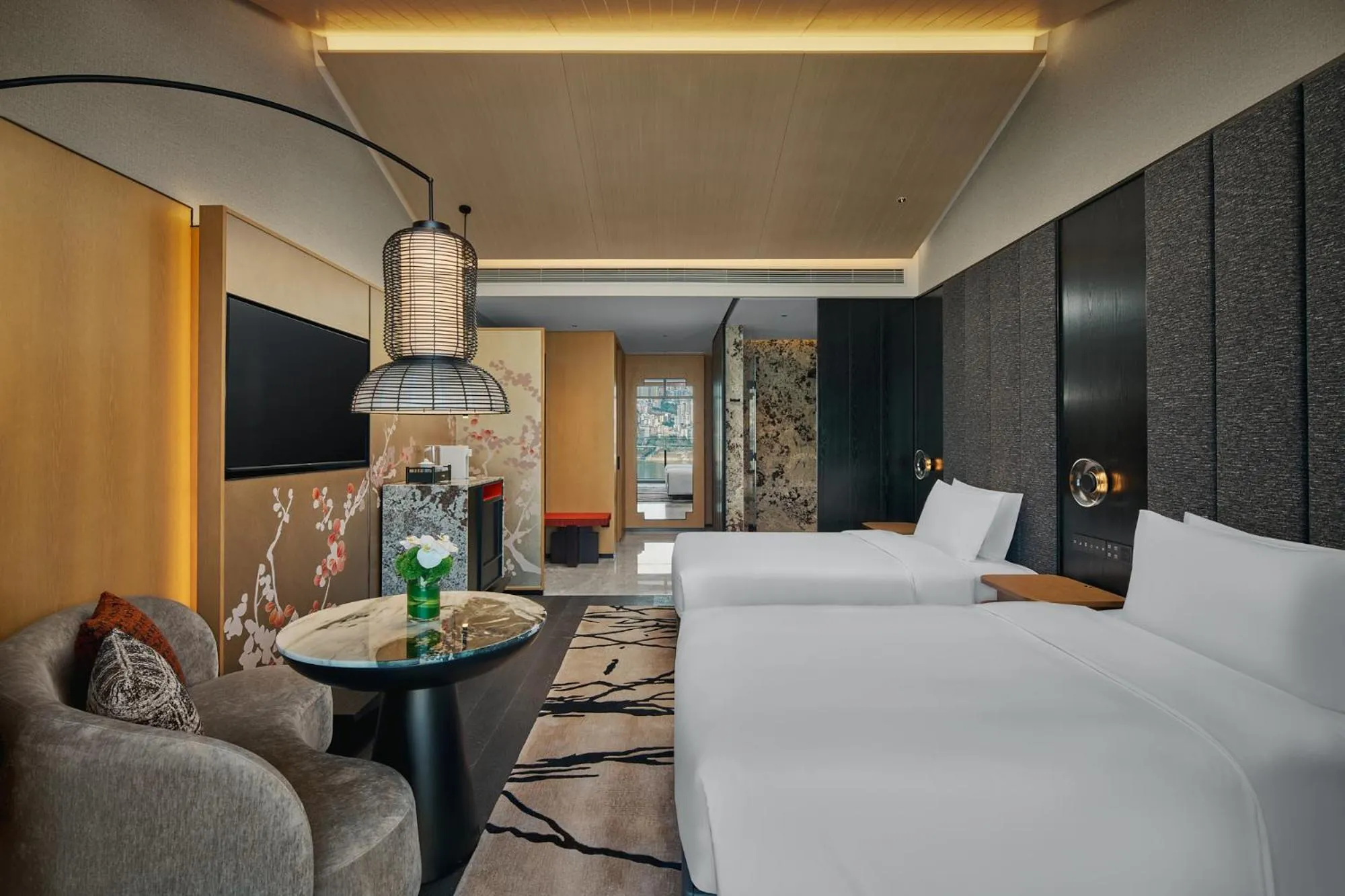 Bed in HUALUXE Hotels and Resorts Chongqing Wushan by IHG