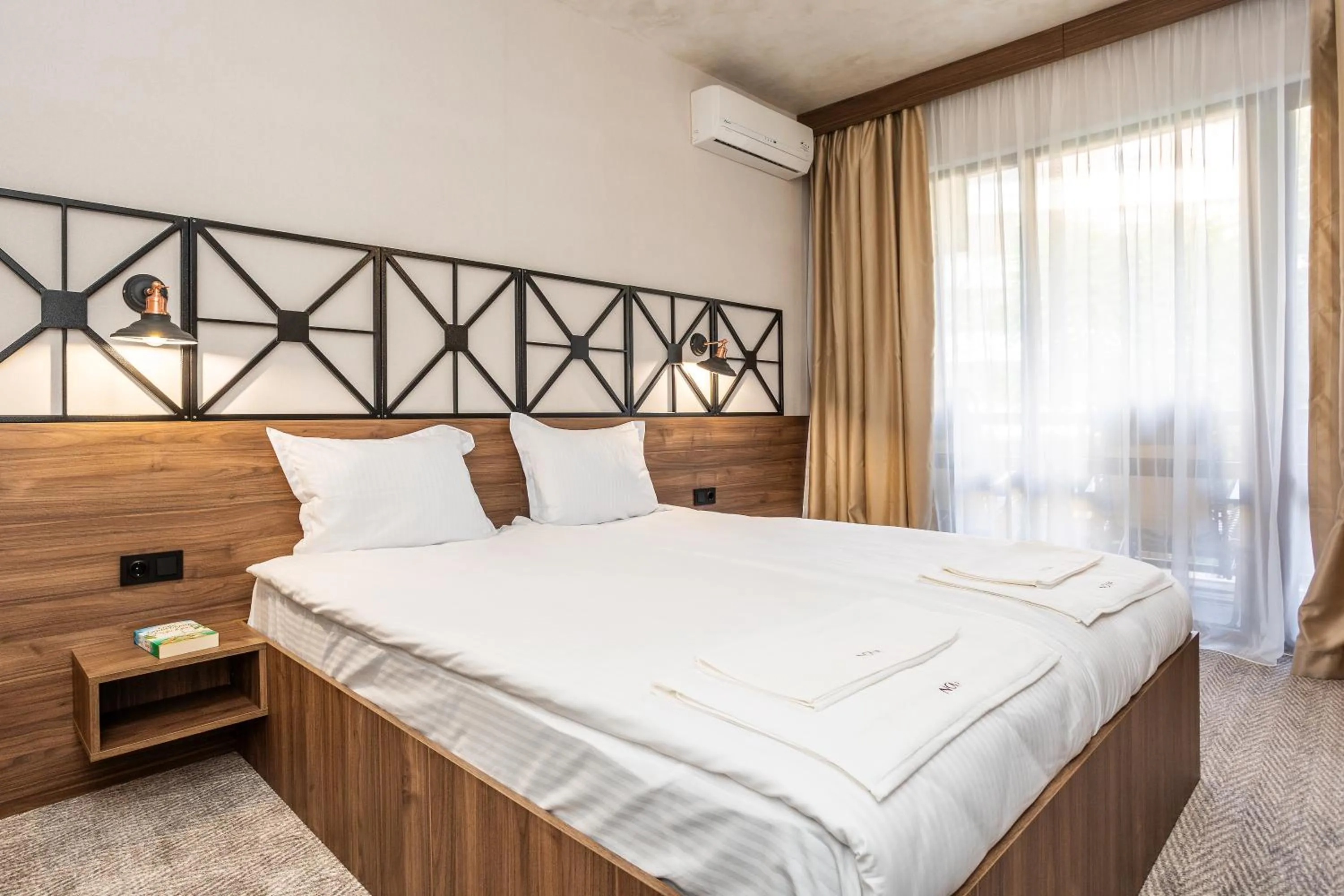 Bedroom, Bed in Noma Boutique Hotel - Adults only