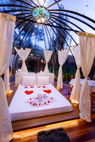 Bed in Pousada Chale Luiz