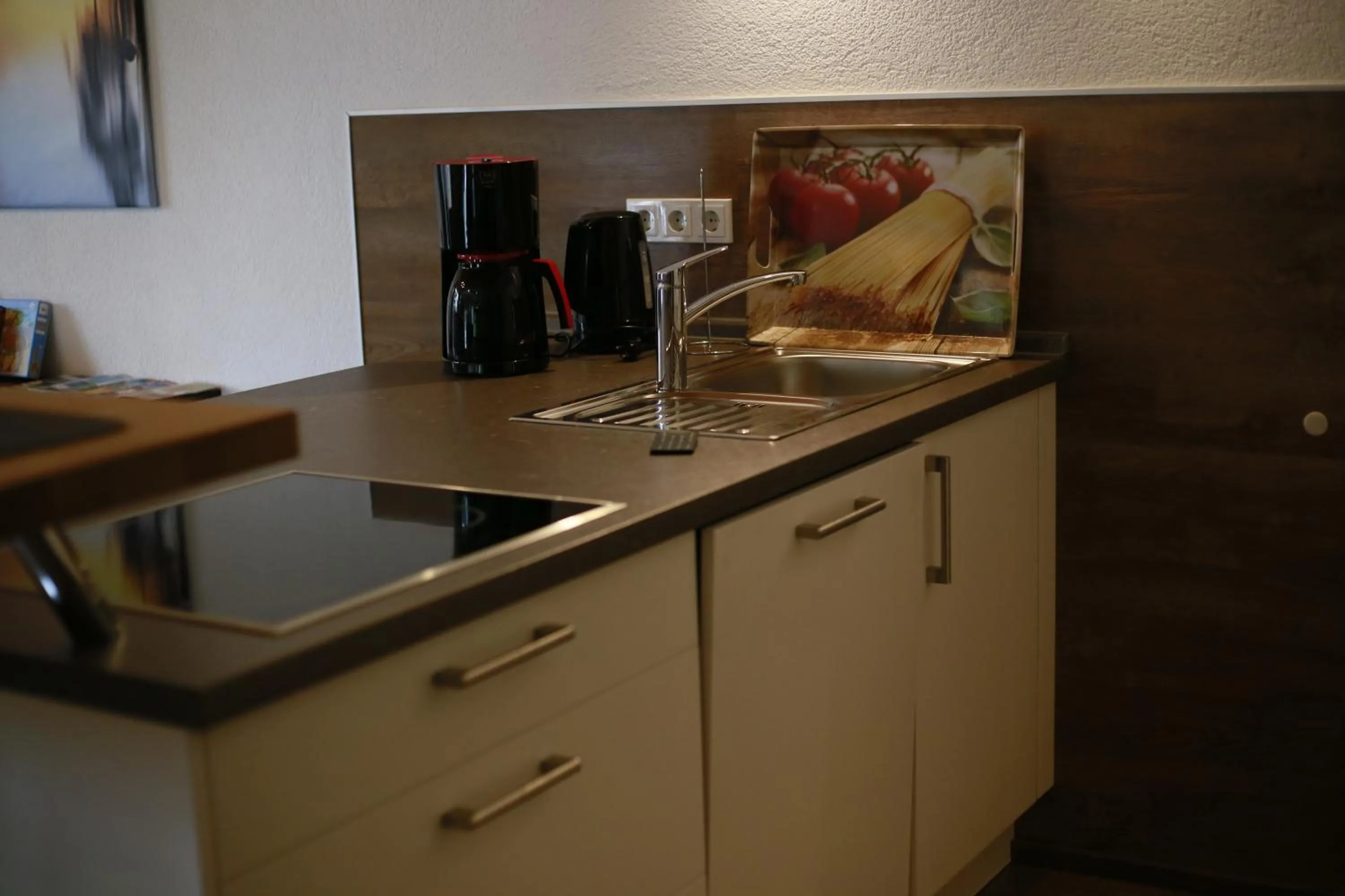 Kitchen or kitchenette in Ferienwohnung am Weinberg