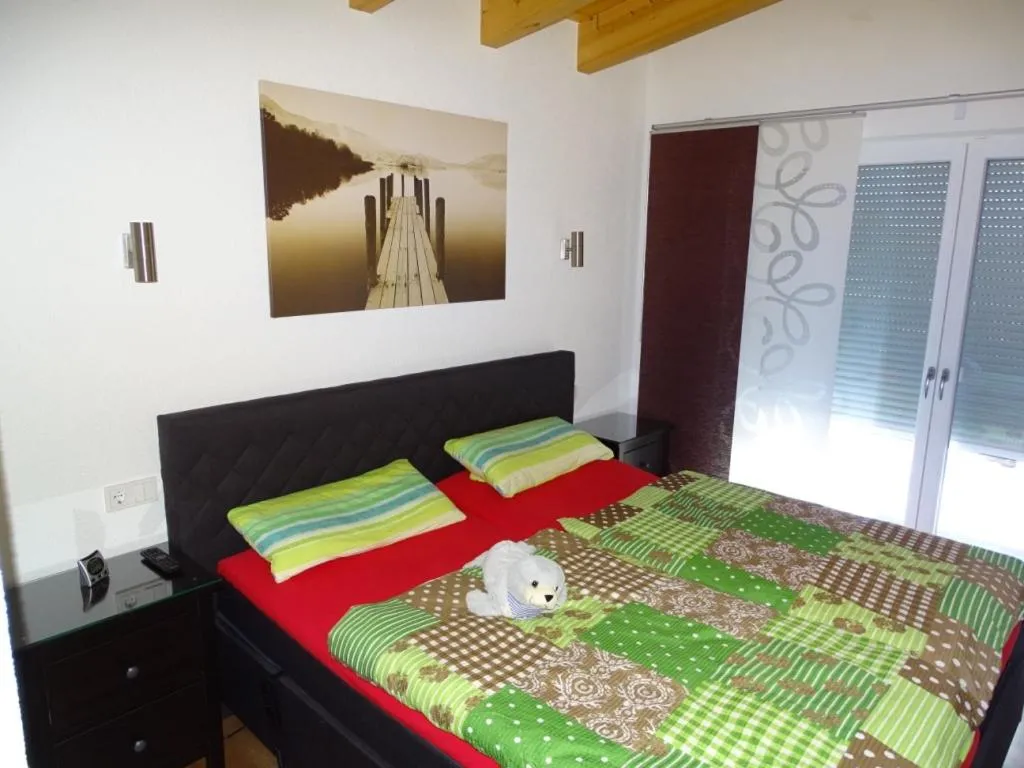 Photo of the whole room, Bed in Ferienwohnung am Weinberg