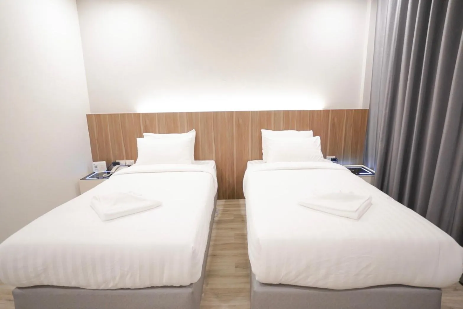 Bed in The Space Airport Hotel Chiang Rai